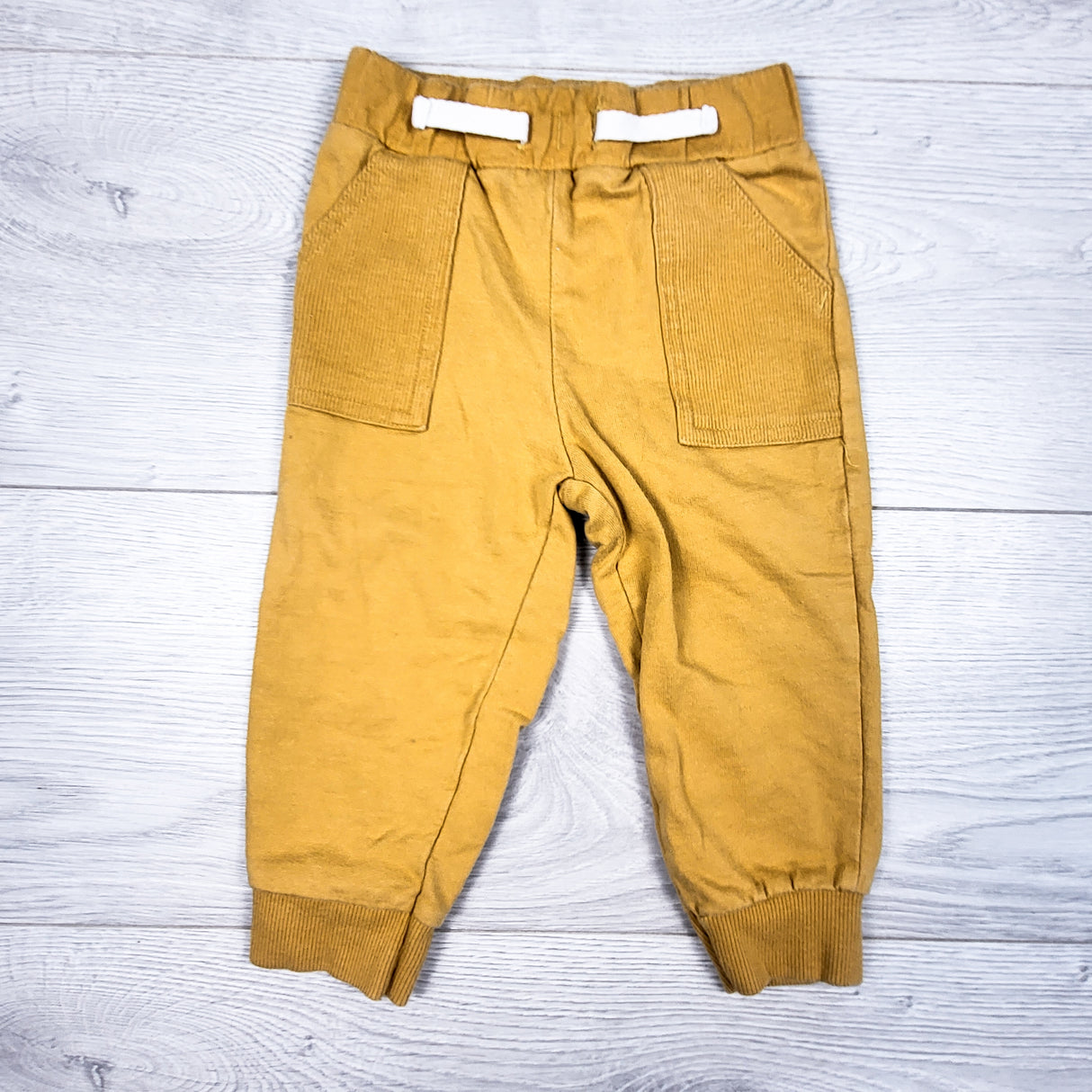 Carters yellow cotton pants. Size 12 months