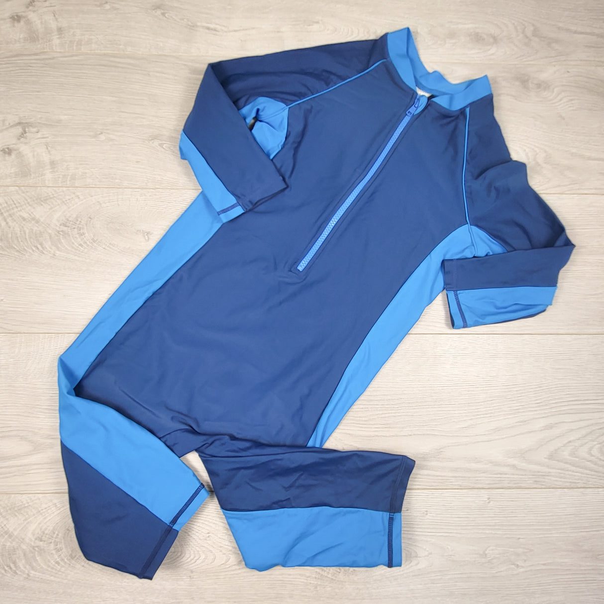 Marks and Spencer navy and blue one piece rash guard. UK size 11/12
