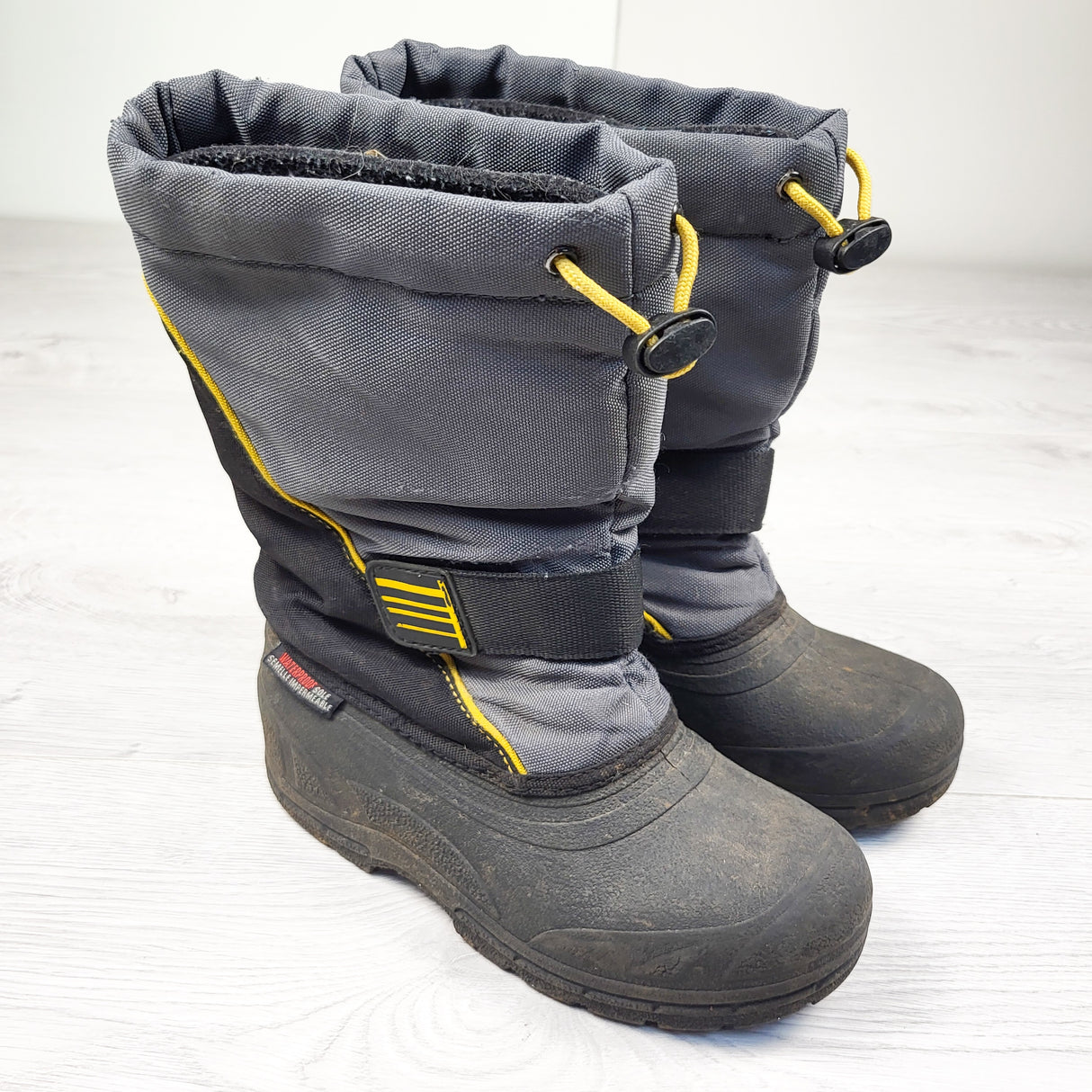 Black and grey snow boots. Youth size 3 (sorry, no shipping)