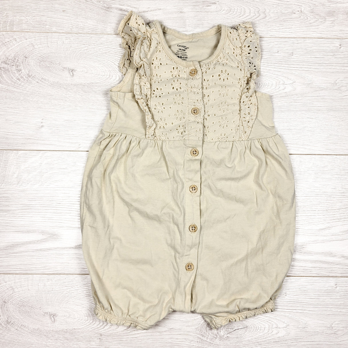 George beige romper with eyelet detail. Size 18-24 months