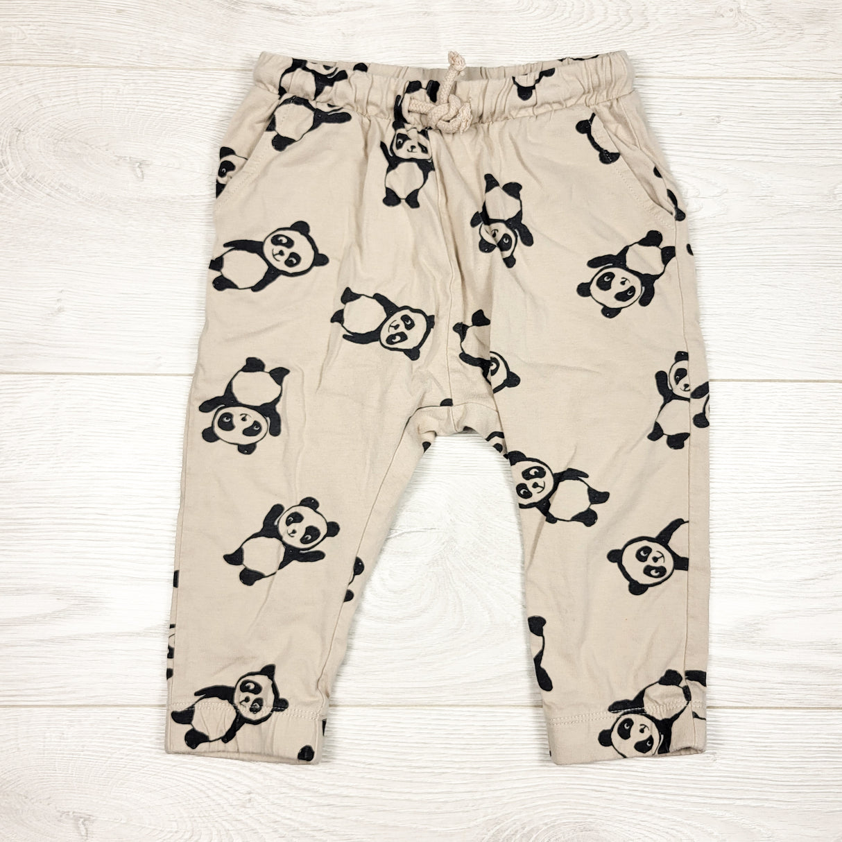H and M beige panda print pants. Size 12-18 months