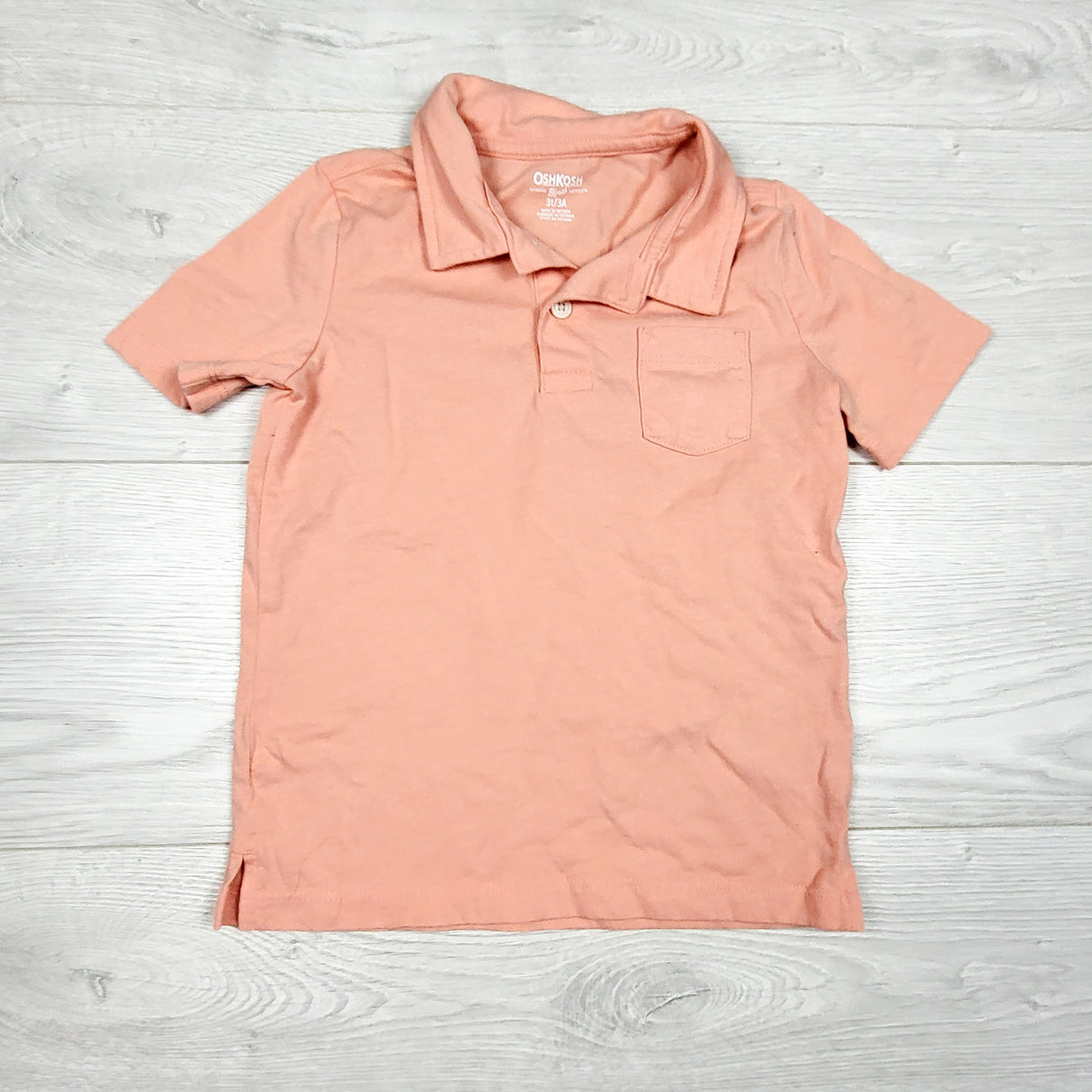 Oshkosh salmon coloured collared t-shirt. Size 3T