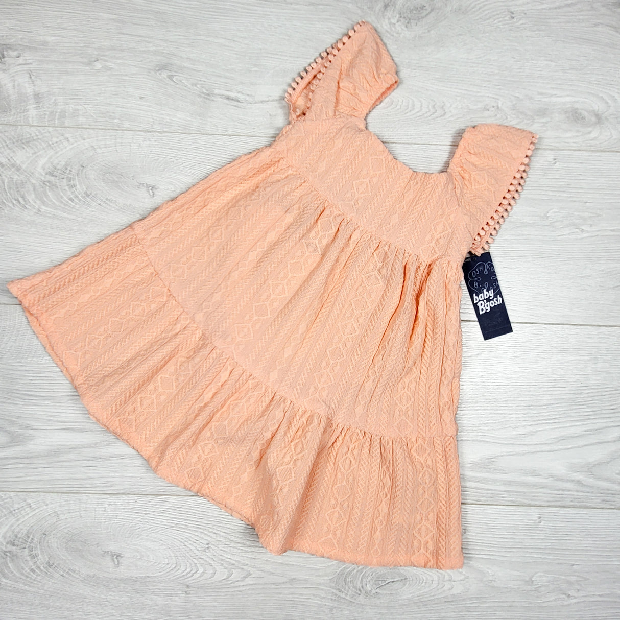 NEW - Baby B'gosh peachy-pink textured dress. Size 18 months