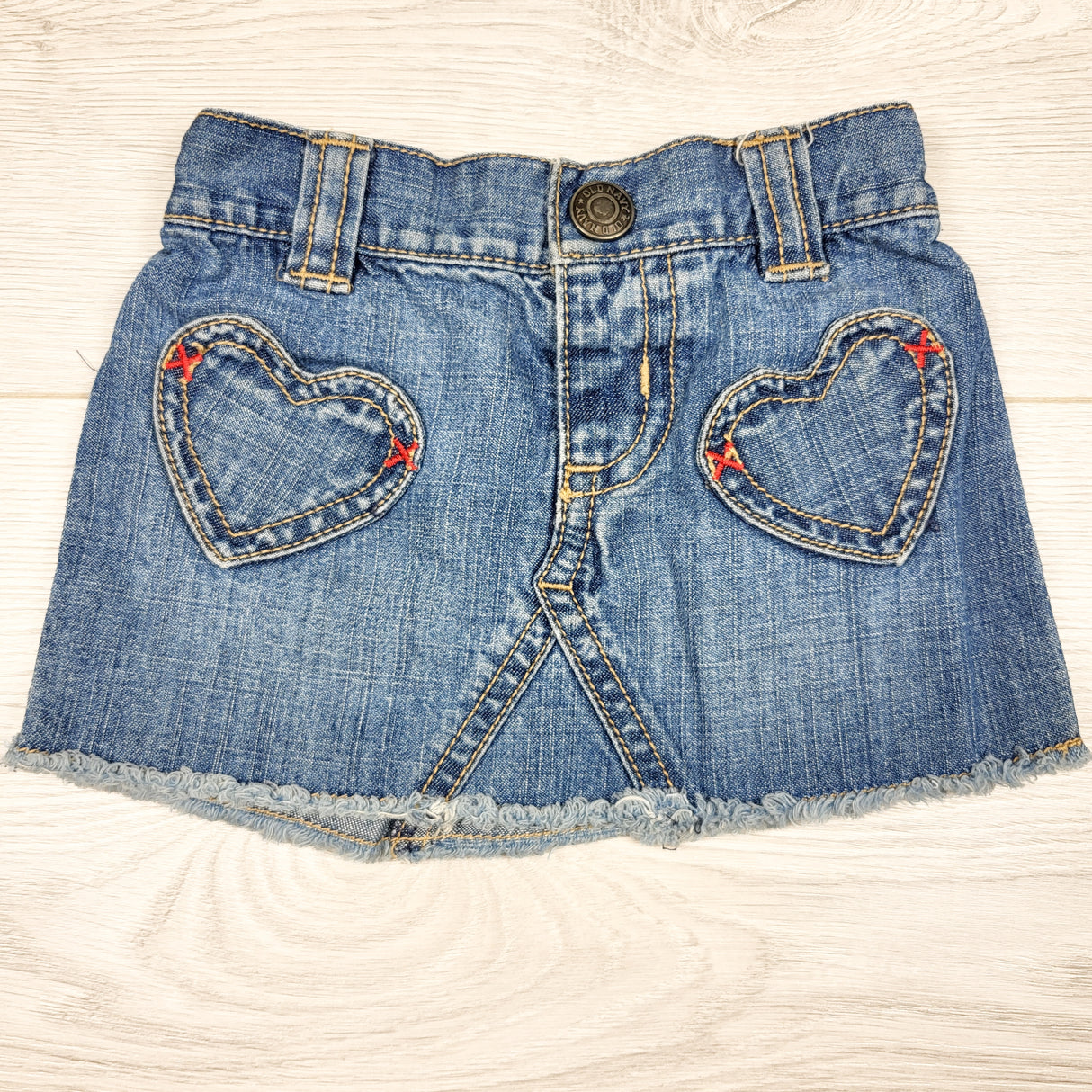 Old Navy denim skirt with heart pockets. Size 3-6 months