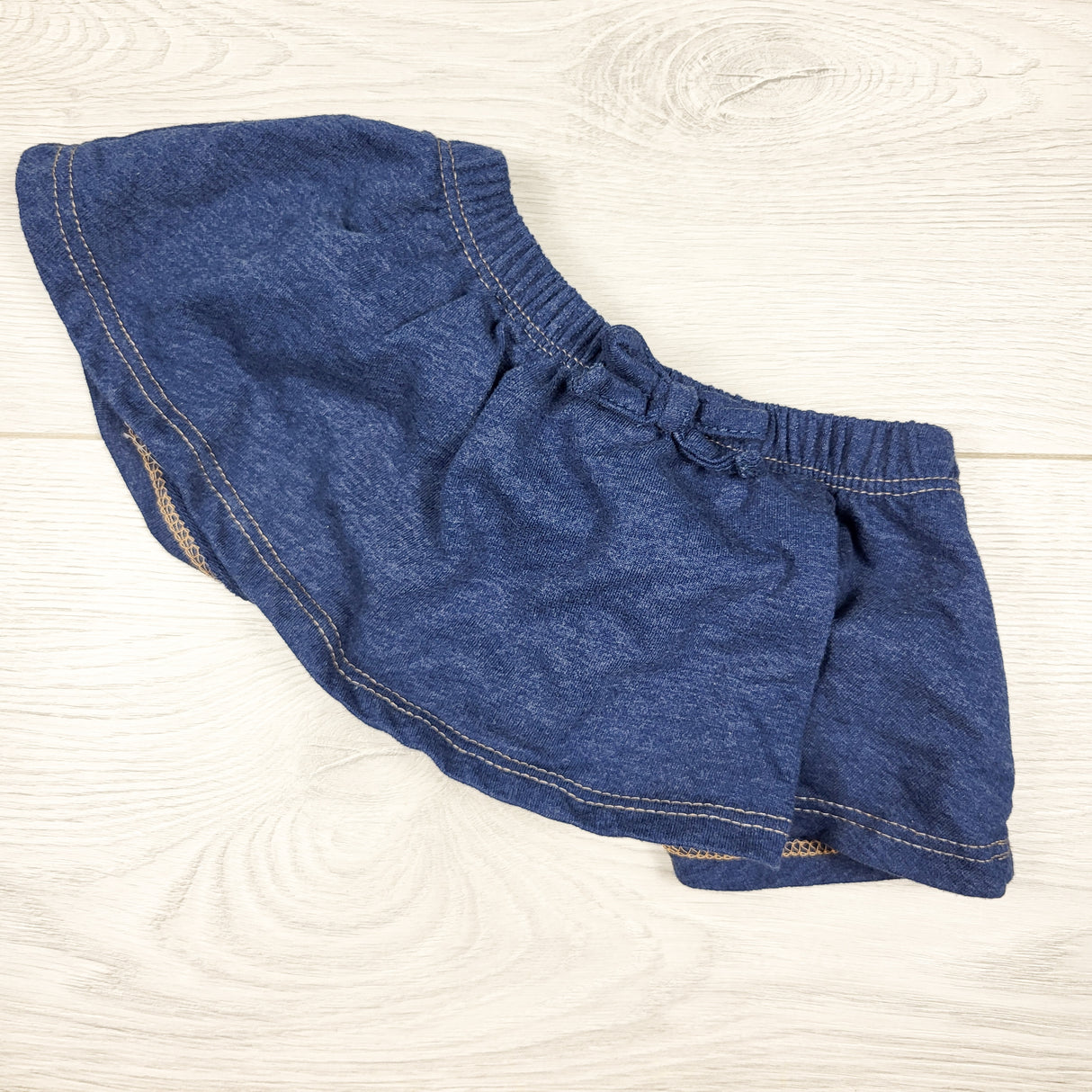 Calvin Klein denim look skirt with built in diaper cover. Size 3-6 months