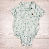 Gap green button down bodysuit with geometric dinosaurs. Size 18-24 months