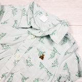 Gap green button down bodysuit with geometric dinosaurs. Size 18-24 months
