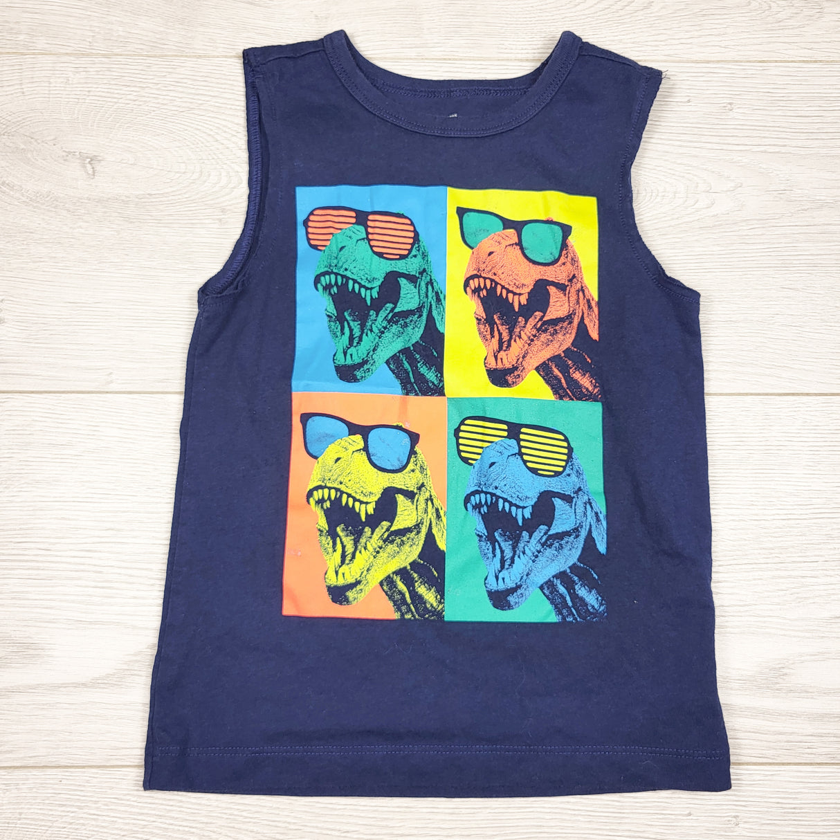 Oshkosh navy tank top with dinosaurs. Size 3T