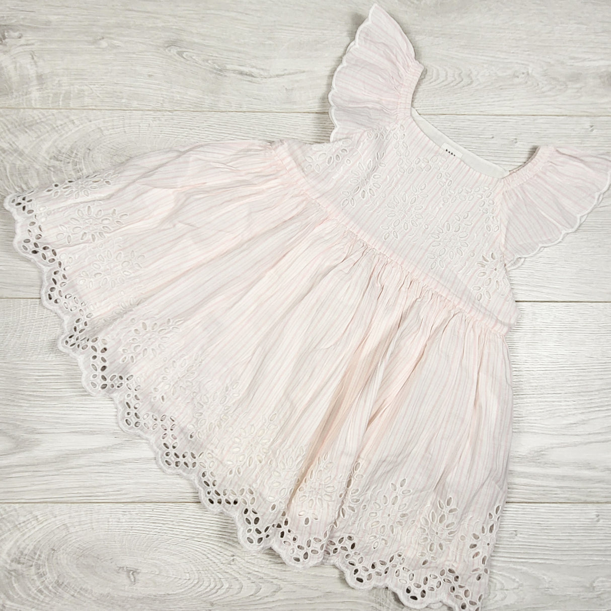 Gap pink and white striped dress with eyelets. Size 18-24 months