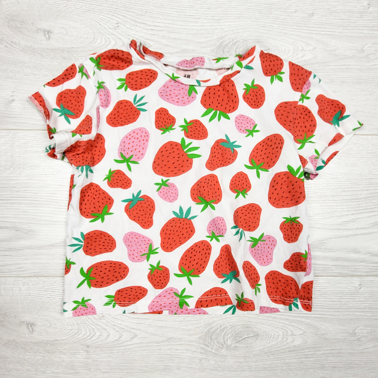 H and M strawberry print t-shirt. Size 2-4T