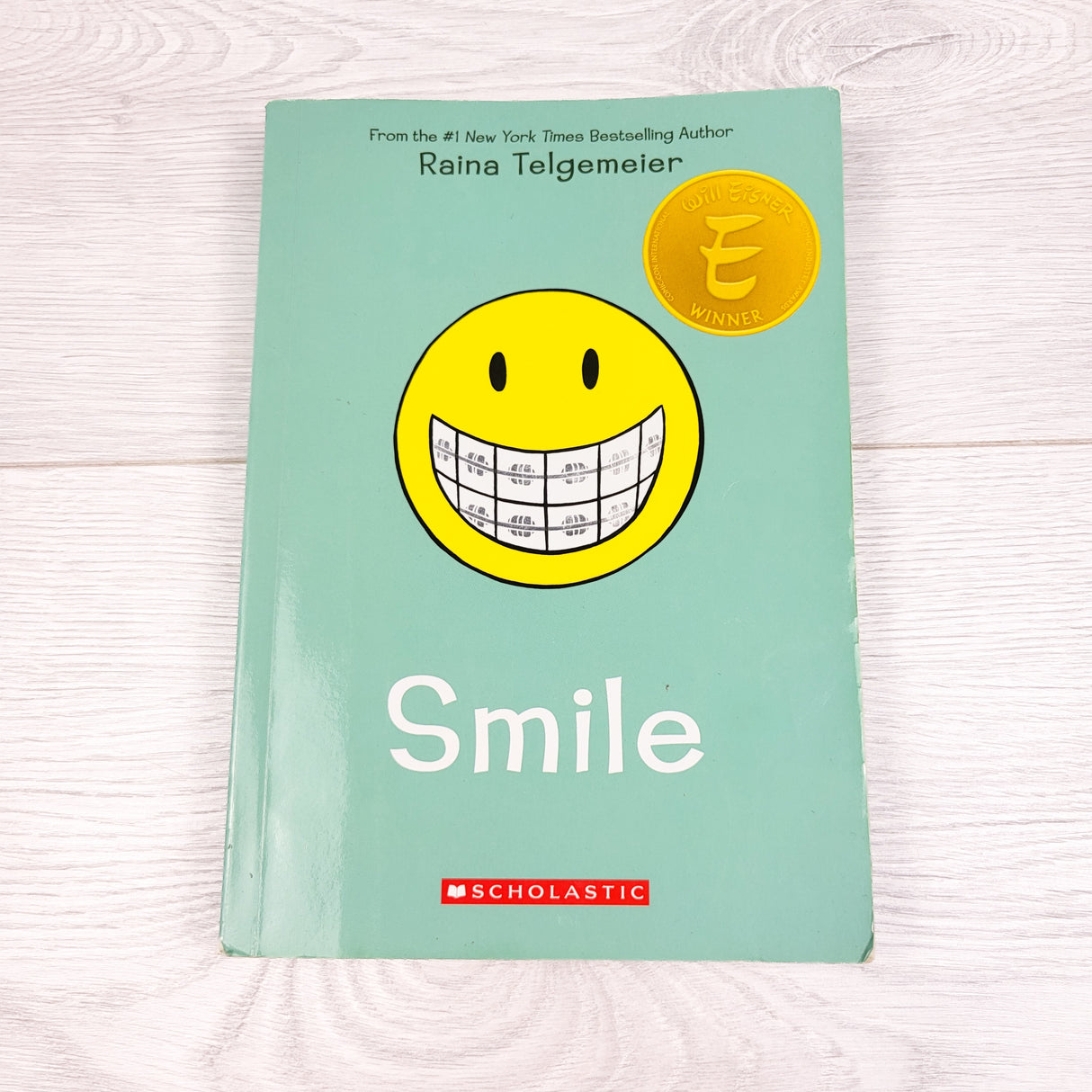 Smile. Soft cover graphic novel