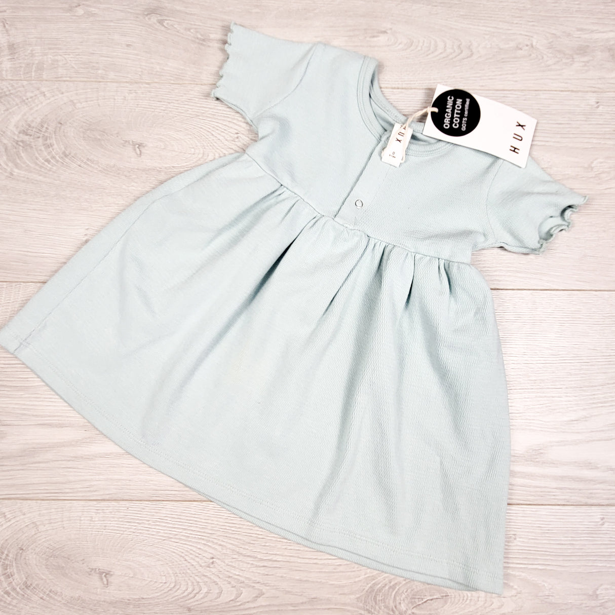 NEW - HuxBaby short sleeve dress in "sea" colour. Size 6-12 months
