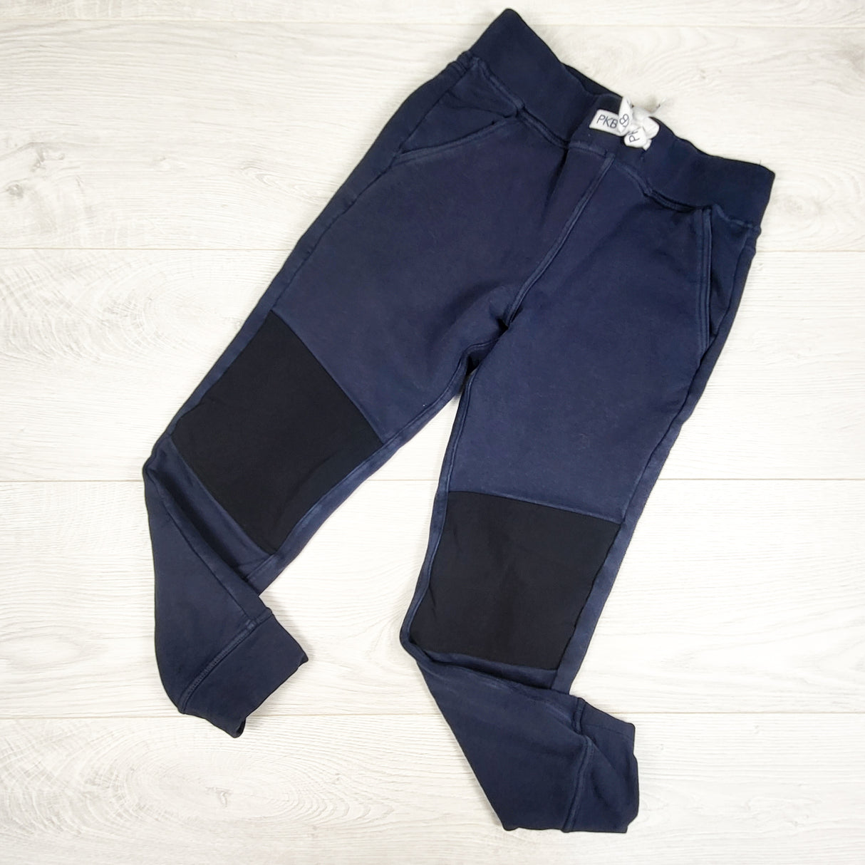 Peekaboo Beans navy "Mudslide" joggers. Size 6