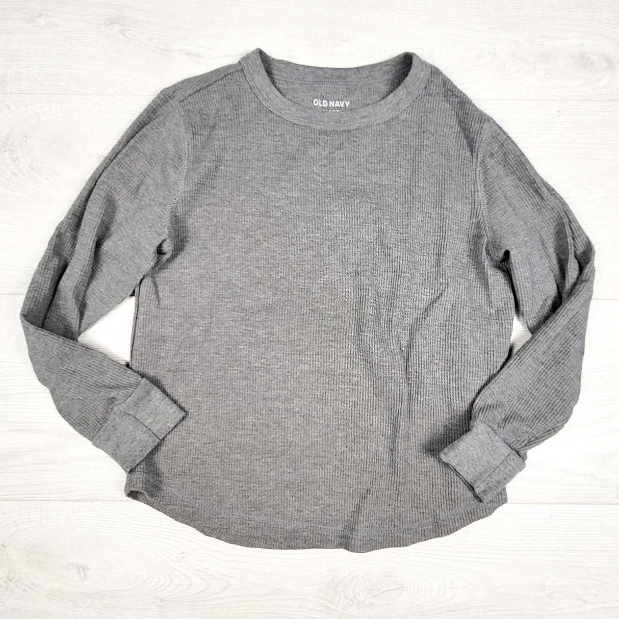 Old Navy grey waffle knit shirt. Size 6/7