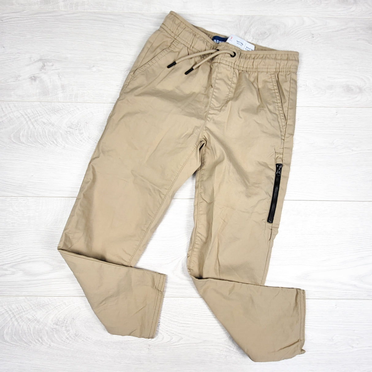 Old Navy tan "Tech Taper" joggers. Size 6/7