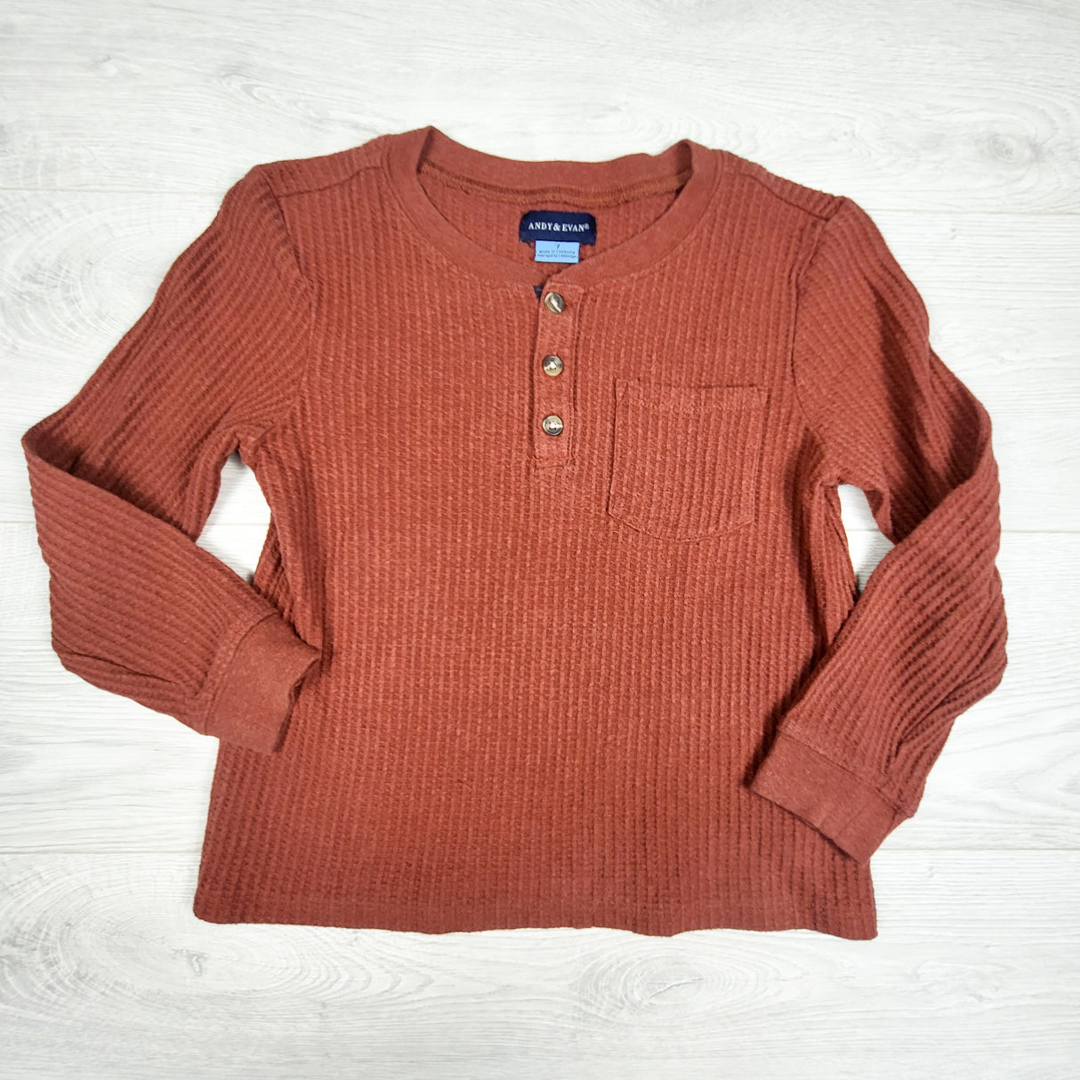 Andy and Evan rust coloured waffle knit long sleeve top. Size 7