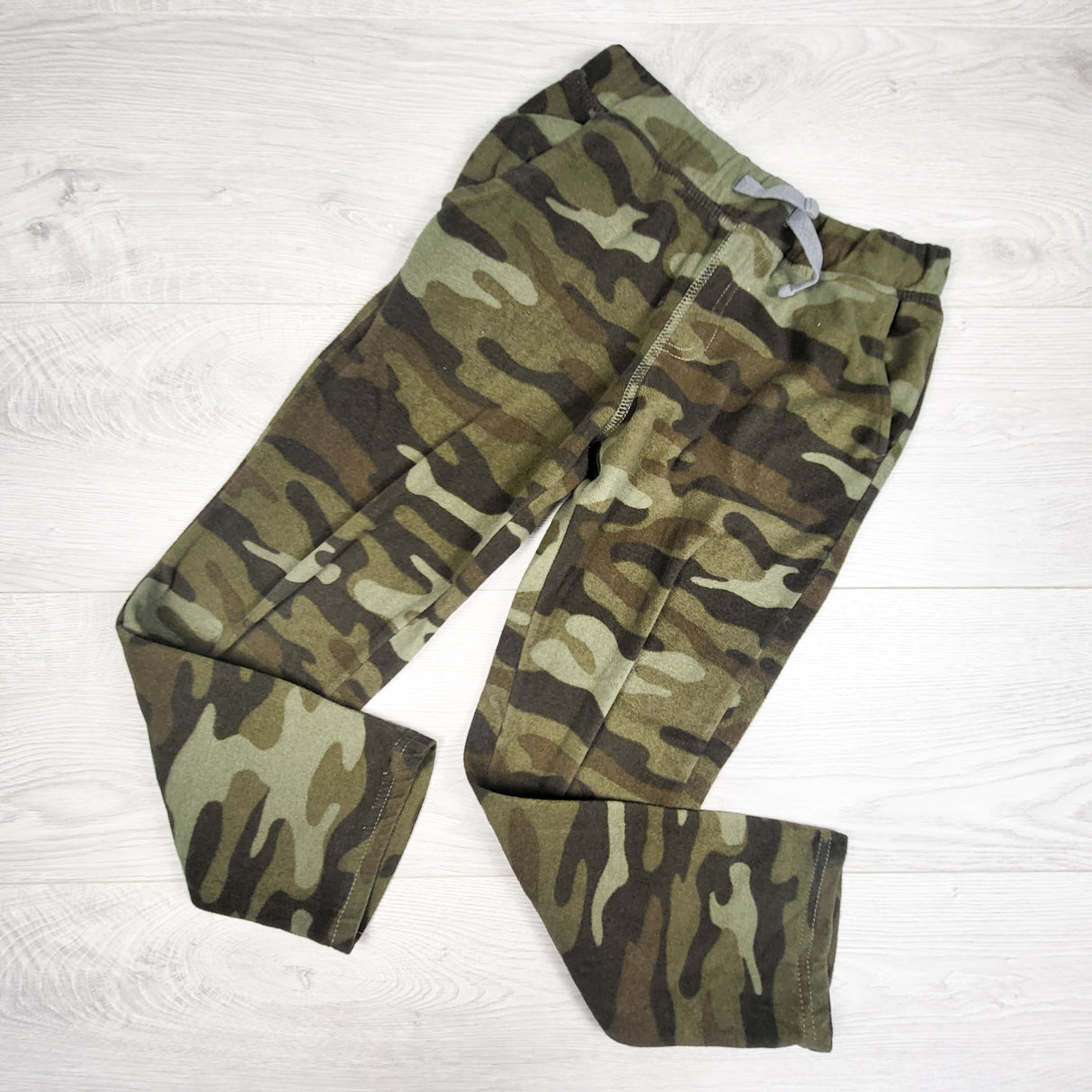 Carters green camouflage fleece pants. Size 7