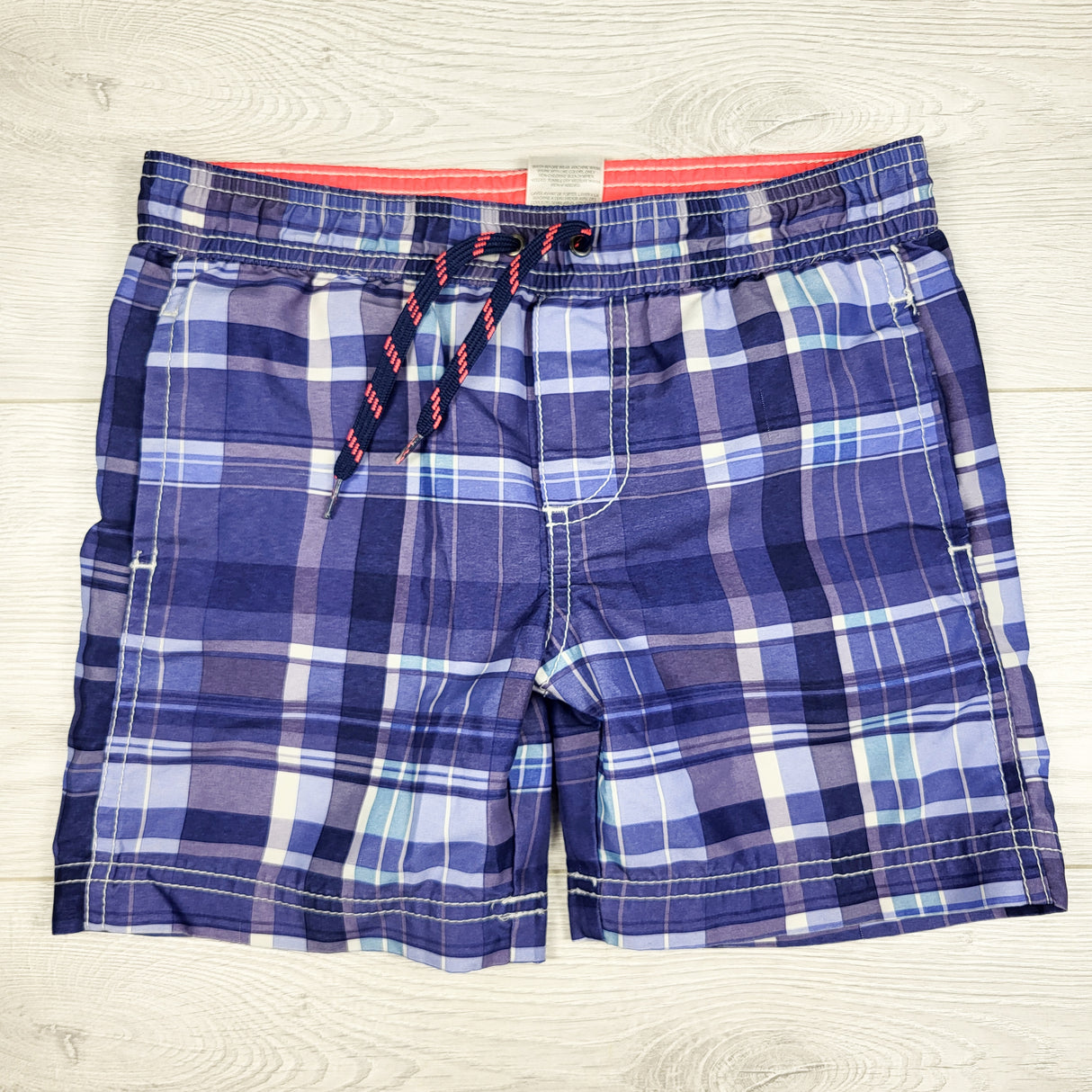 Carters blue plaid swim shorts. Size 4T
