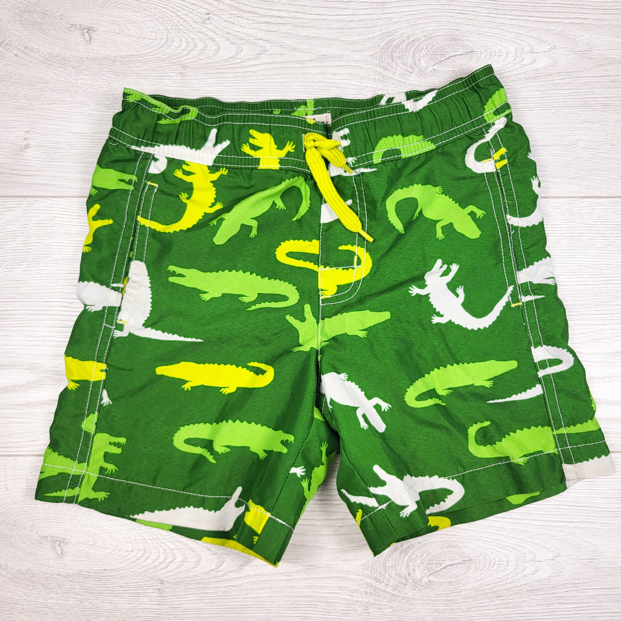 Hatley green alligator print swim shorts. Size 4T