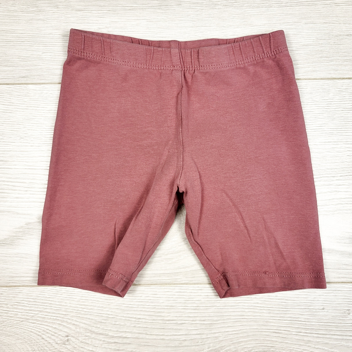 H and M dusty pink bike shorts. Size 2/3T
