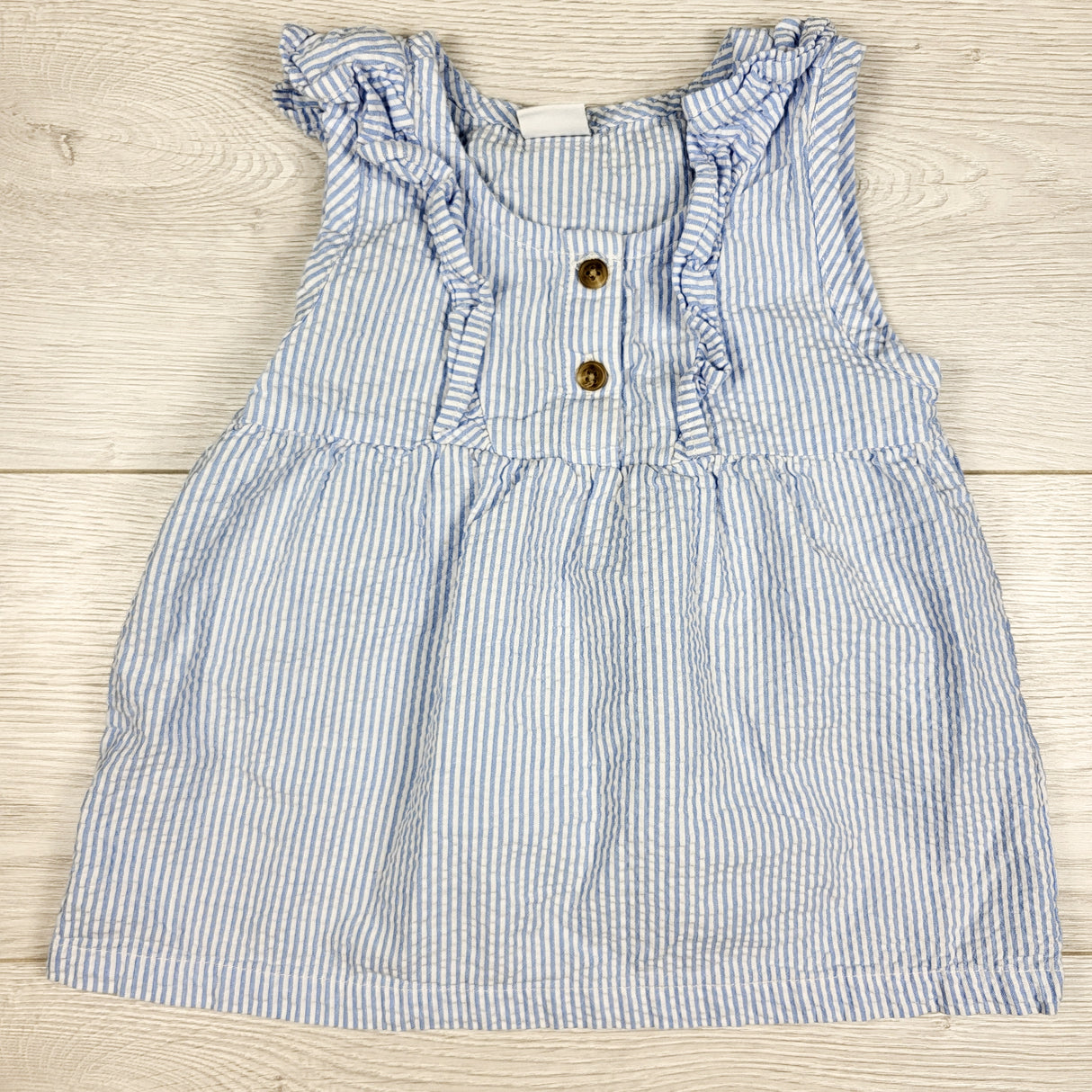 Pekkle blue pin striped top with ruffles. Size 4T
