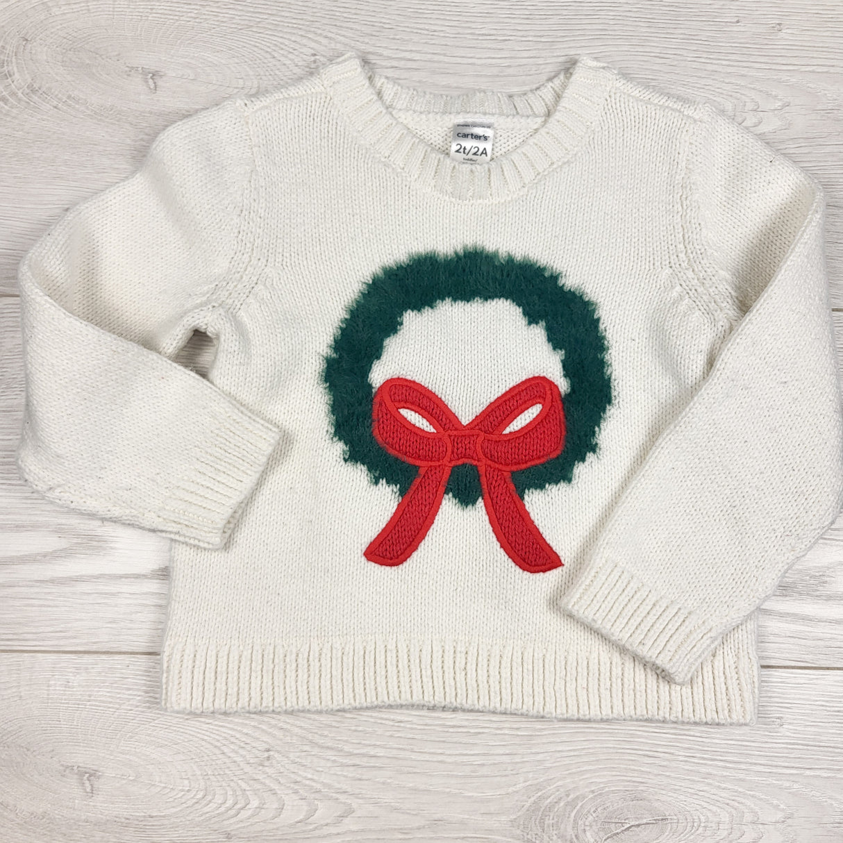 Carters white sweater with holiday wreath. Size 2T