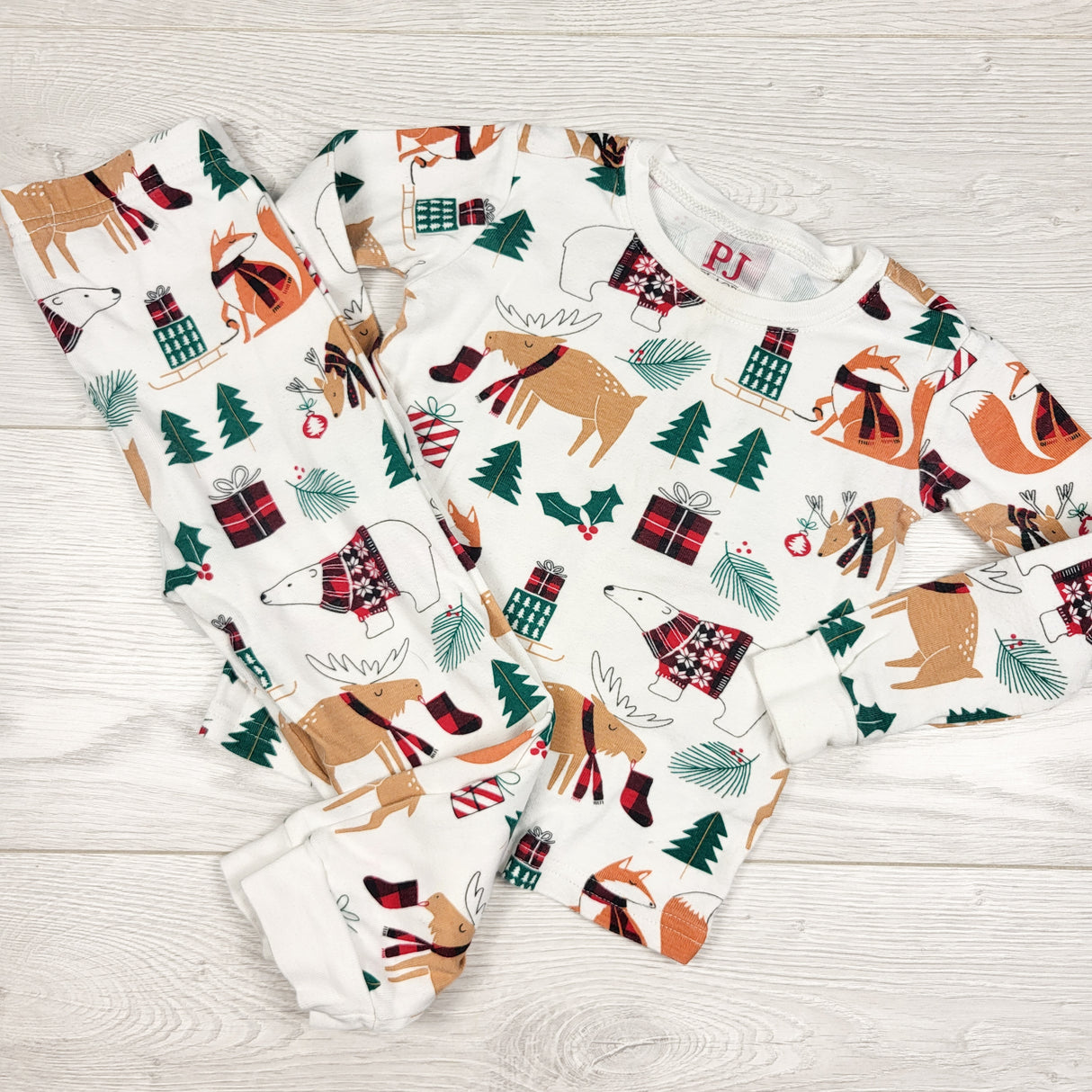 Children's Place white 2pc PJs with woodland animals. Size 2T