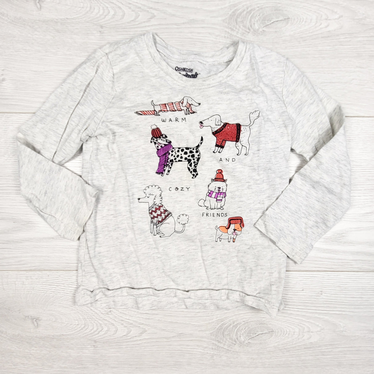 Oshkosh grey top with dogs in sweaters. Size 24 months