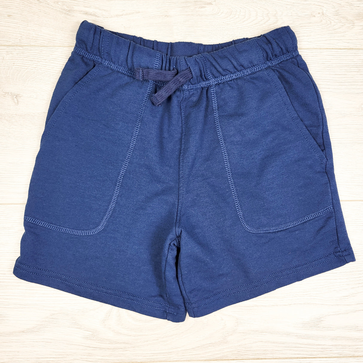 Carters blue drawstring shorts. Size 7