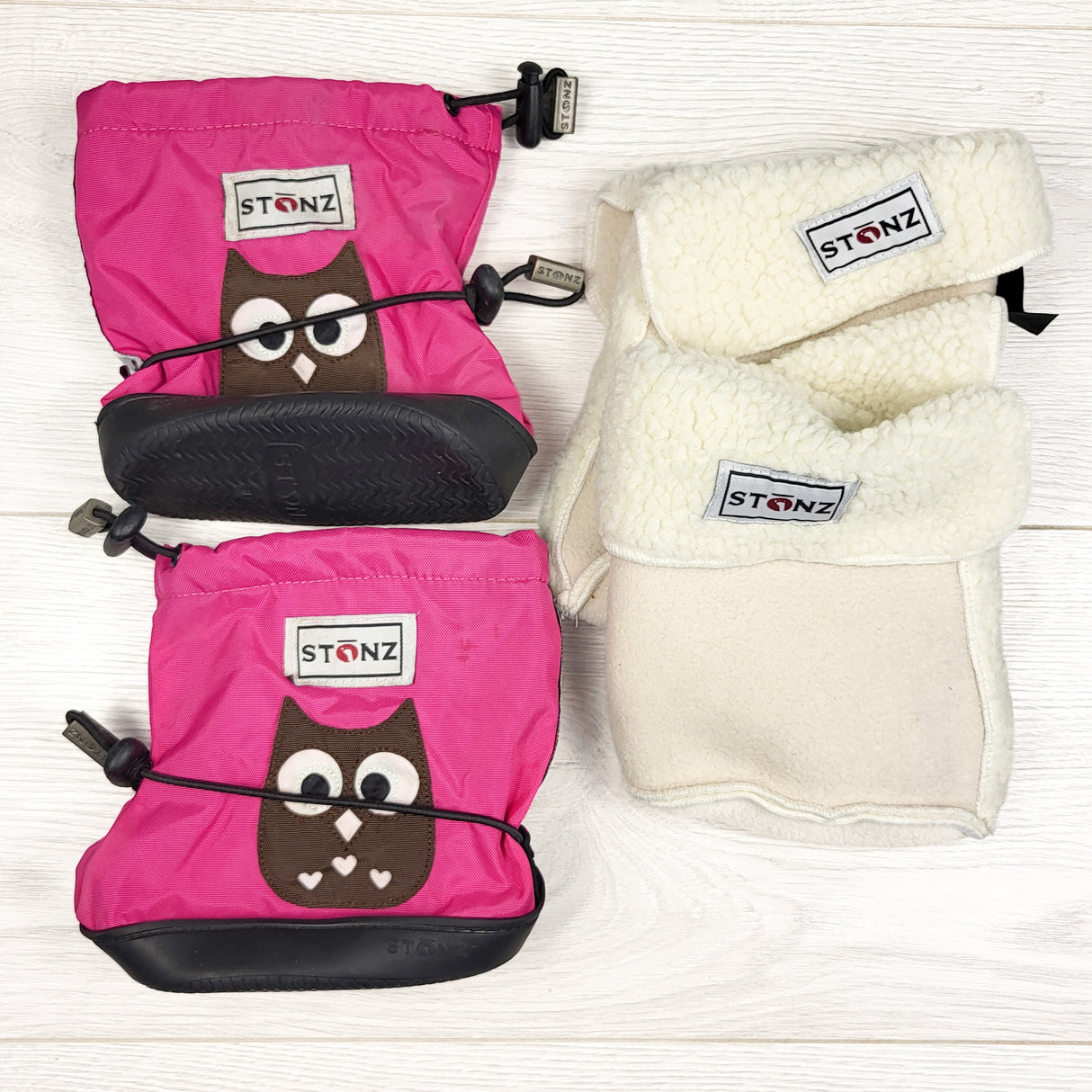 Stonz pink waterproof booties and fleece liners. Size medium (6-18 months)