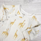 Pehr white organic cotton sleeper with giraffes.