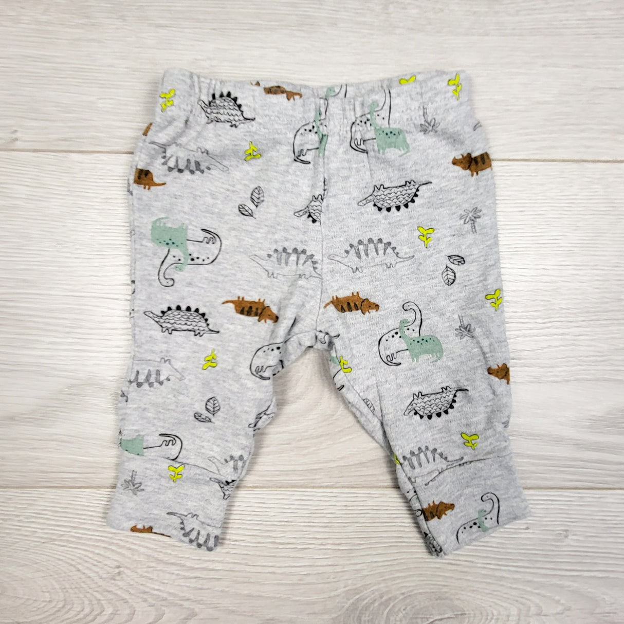 Child of Mine grey pants with dinosaurs. Size 0-3 months