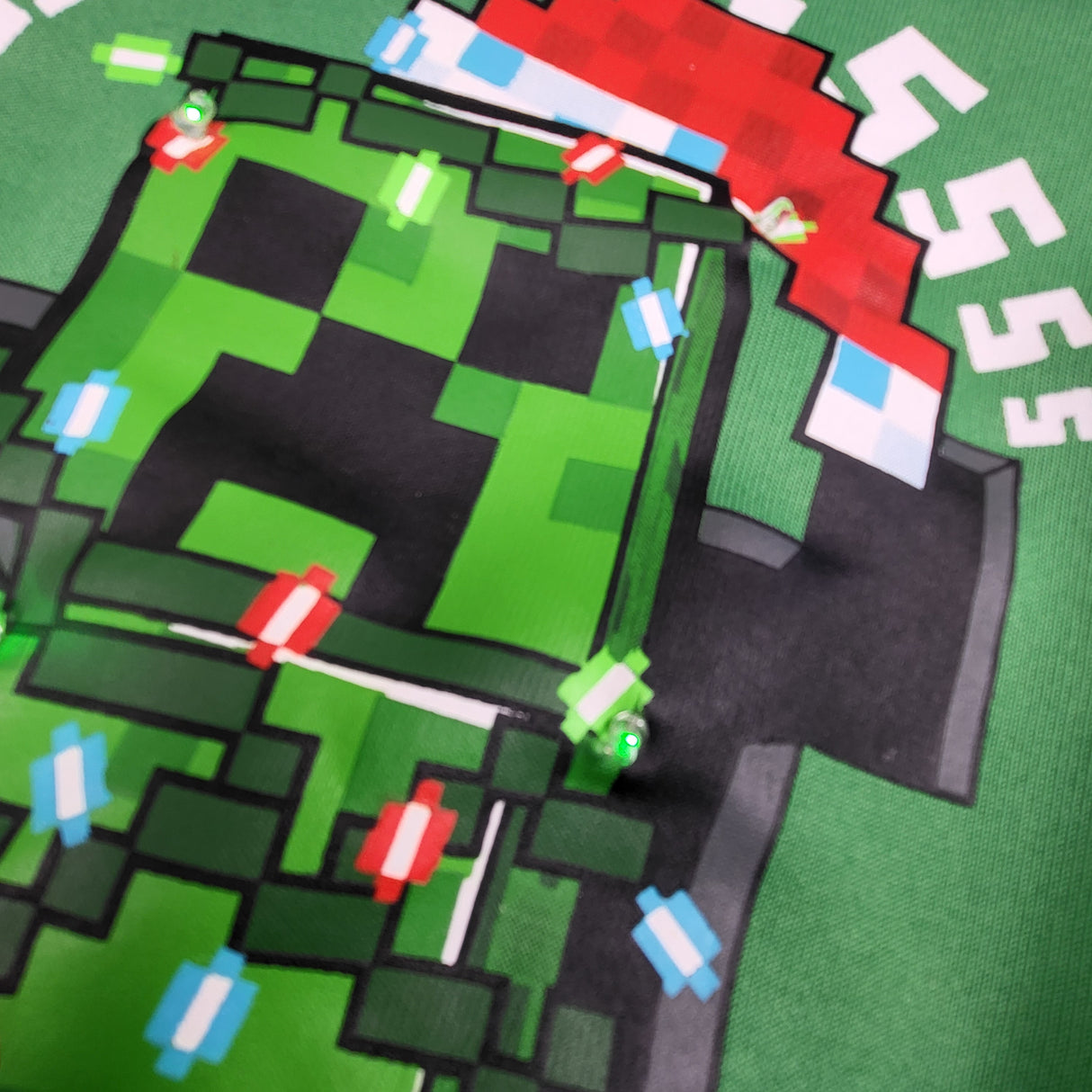 Mad Engine green light-up Minecraft hoodie. Size 4/5T