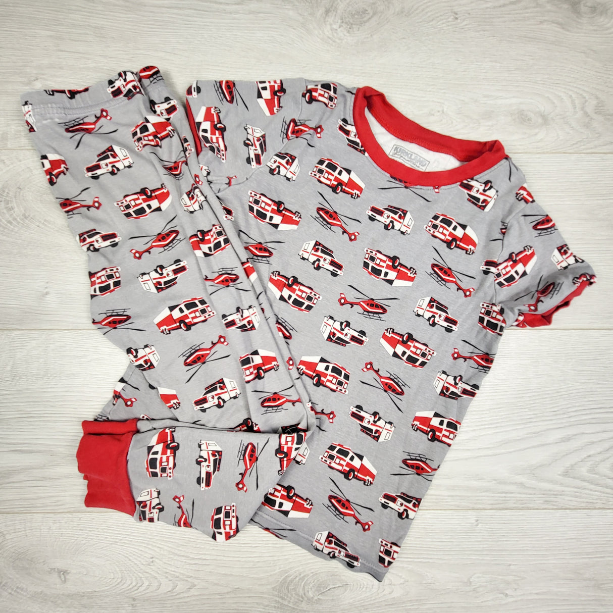 Kirkland grey 2pc PJs with fire trucks. Size 7
