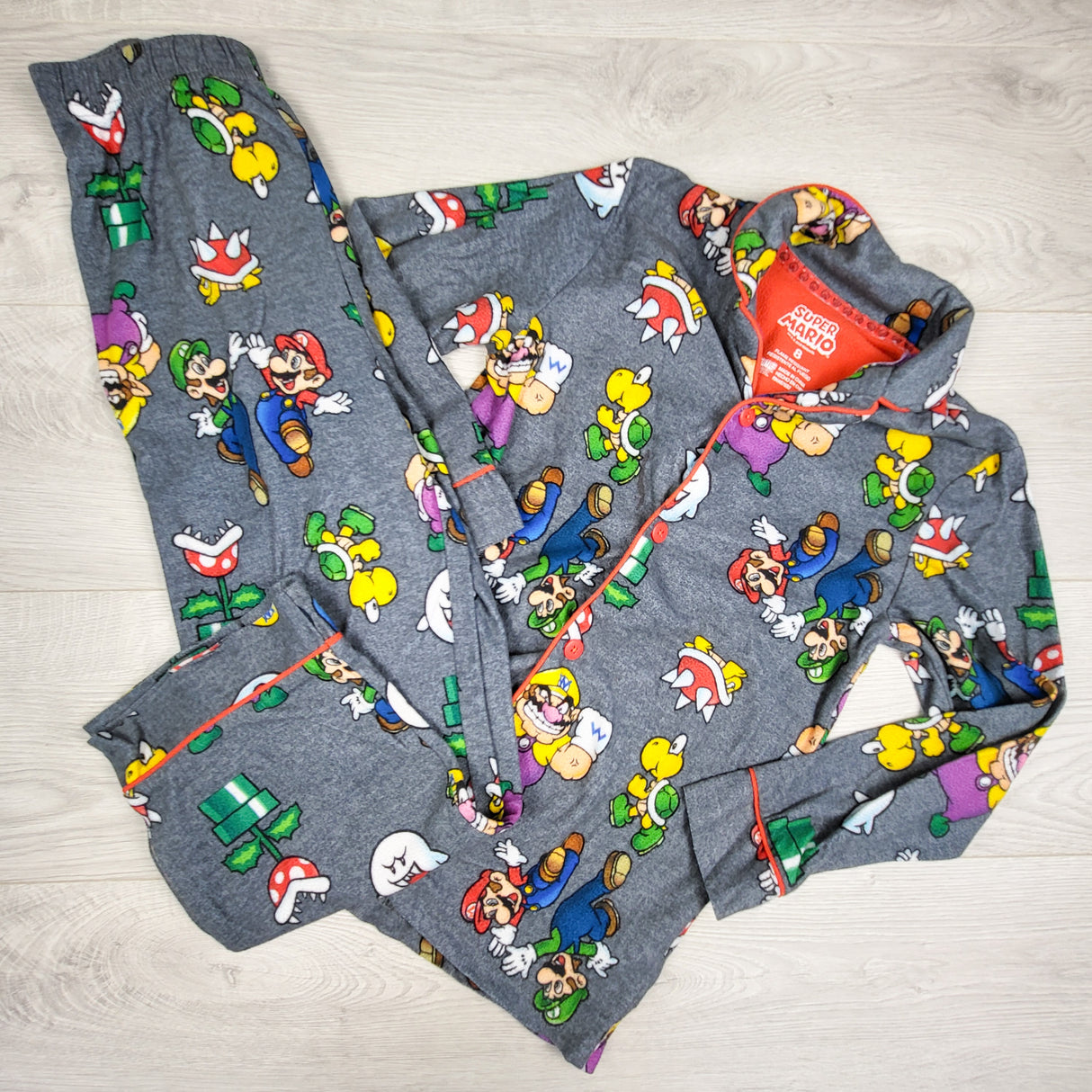 Grey Super Mario 2pc button down PJs. Size 8