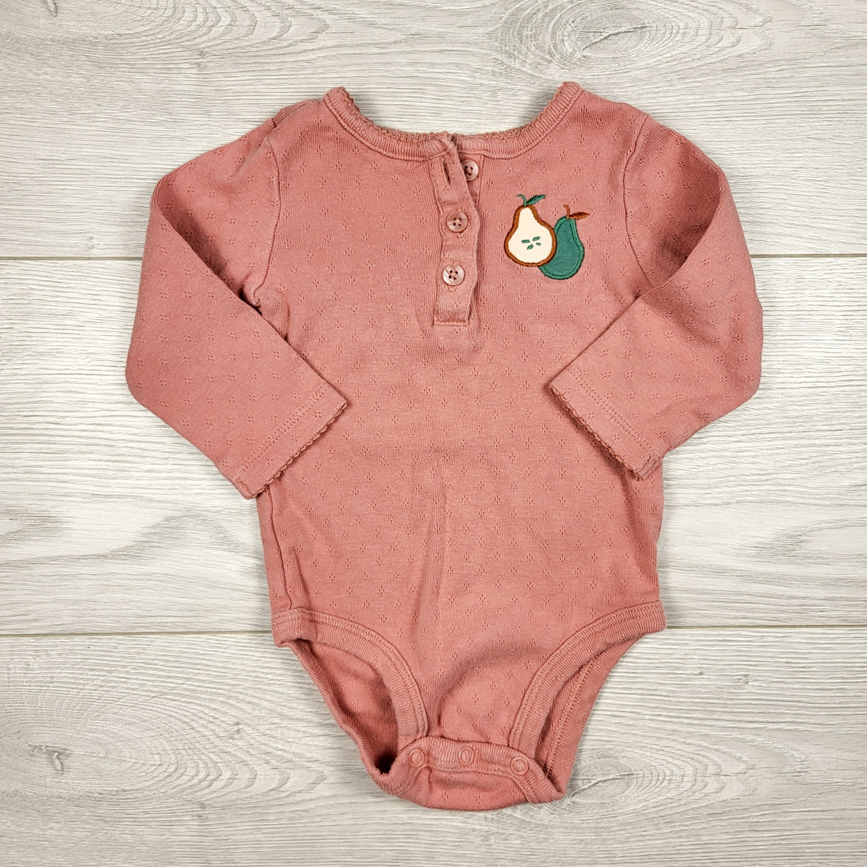 Carters pink pointelle bodysuit with pears. Size 6 months