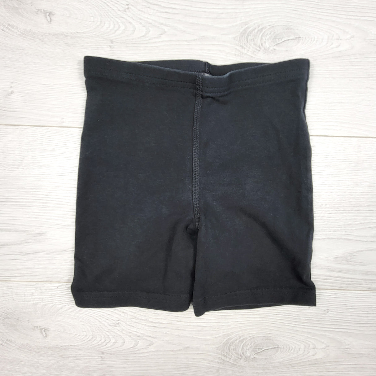 Peekaboo Beans black bike shorts. Size 8