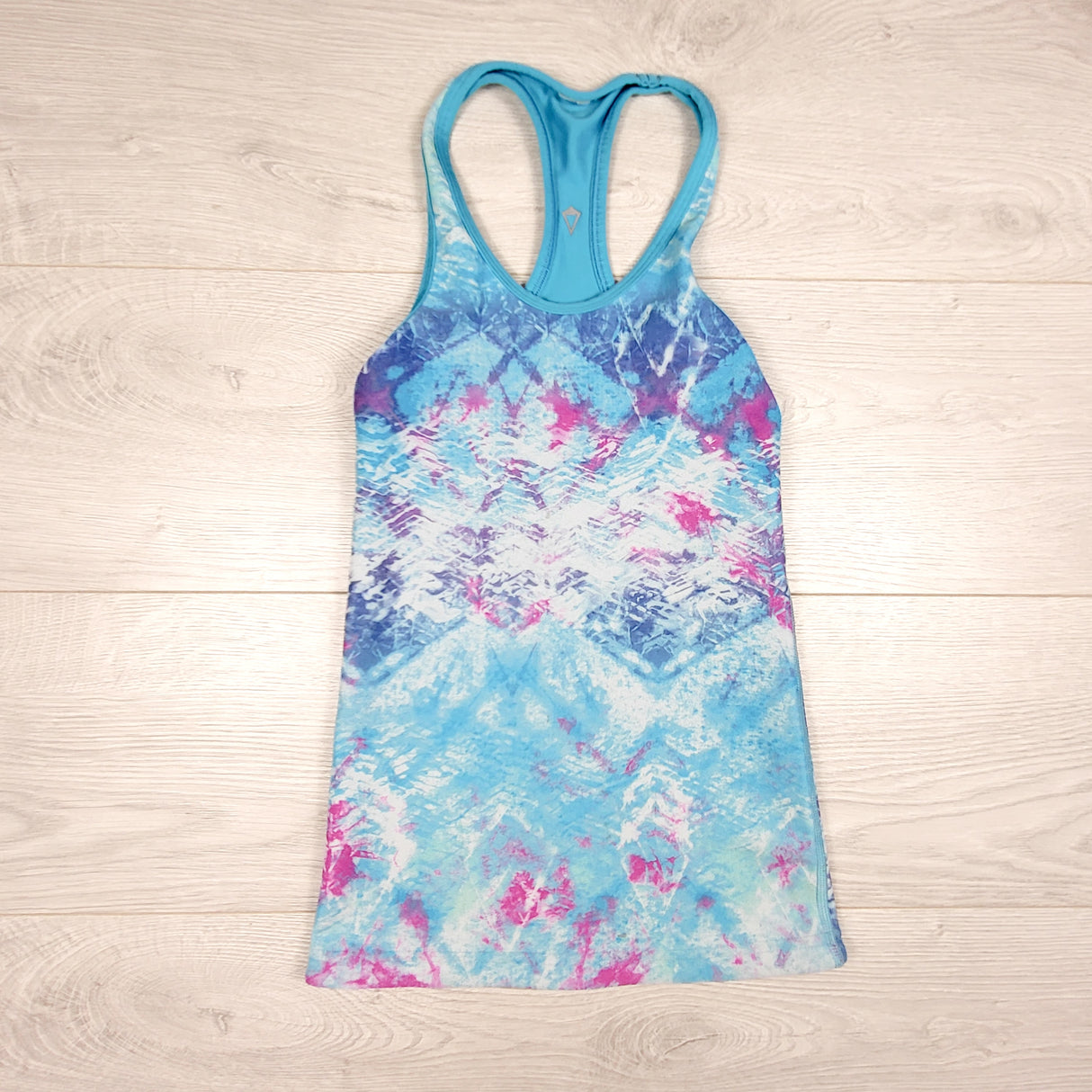 Ivivva (Lululemon) blue patterned reversible active tank. Approx 8-10 Years