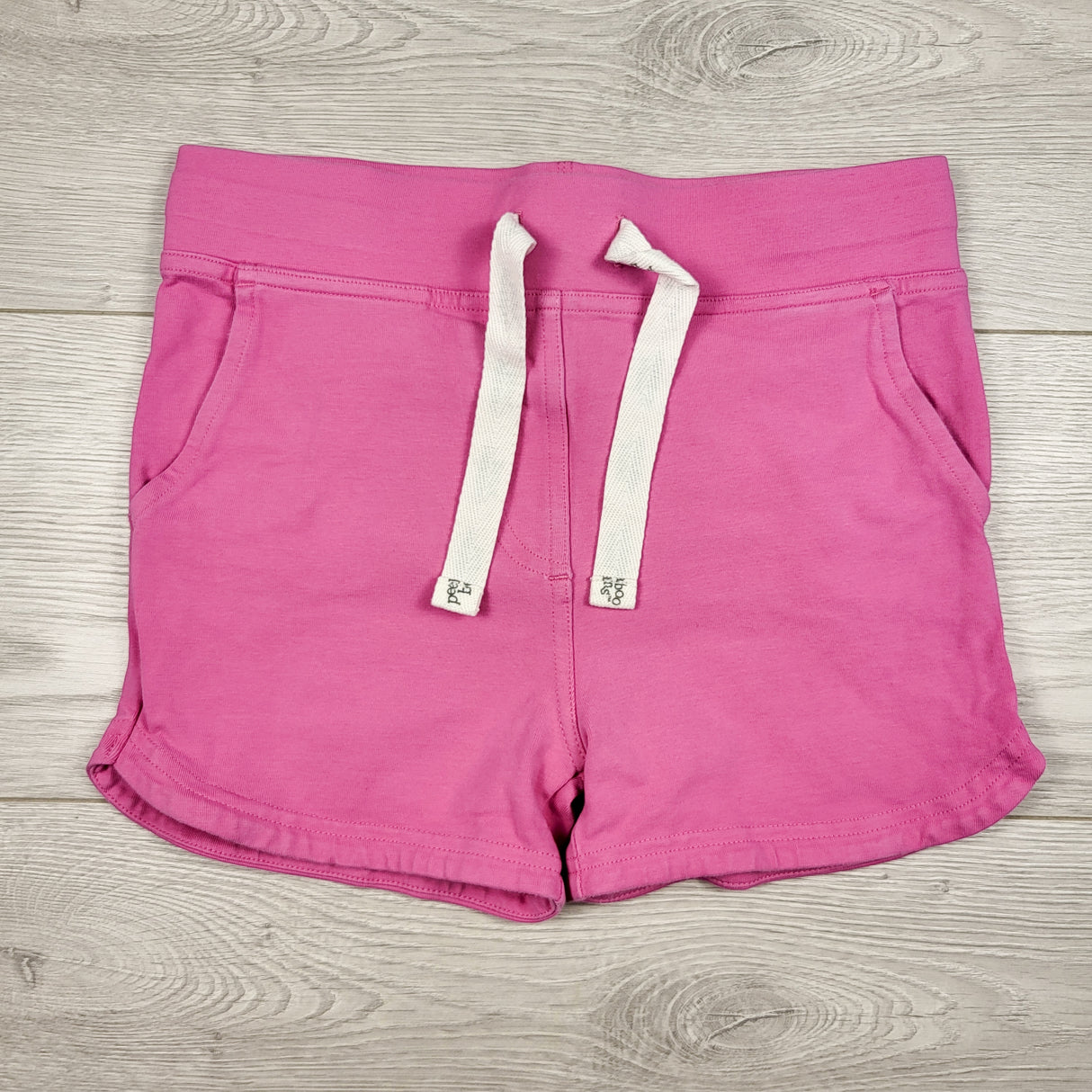Peekaboo Beans pink drawstring shorts. Size 8
