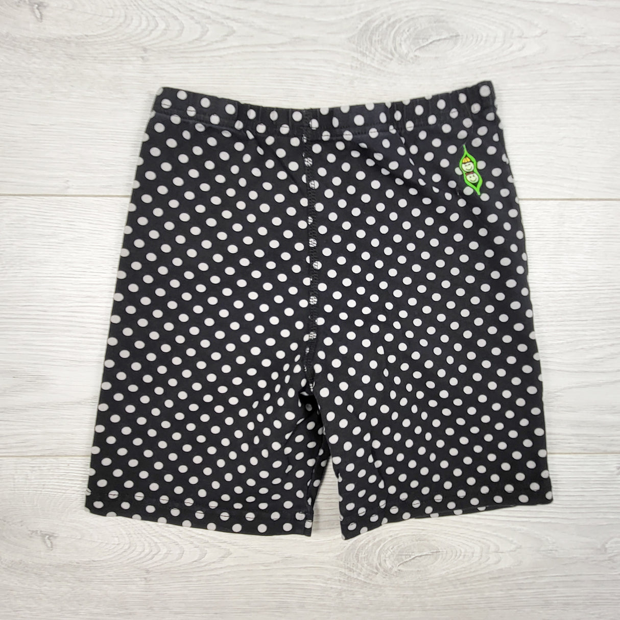 Peekaboo Beans black polka dot bike shorts. Size 8