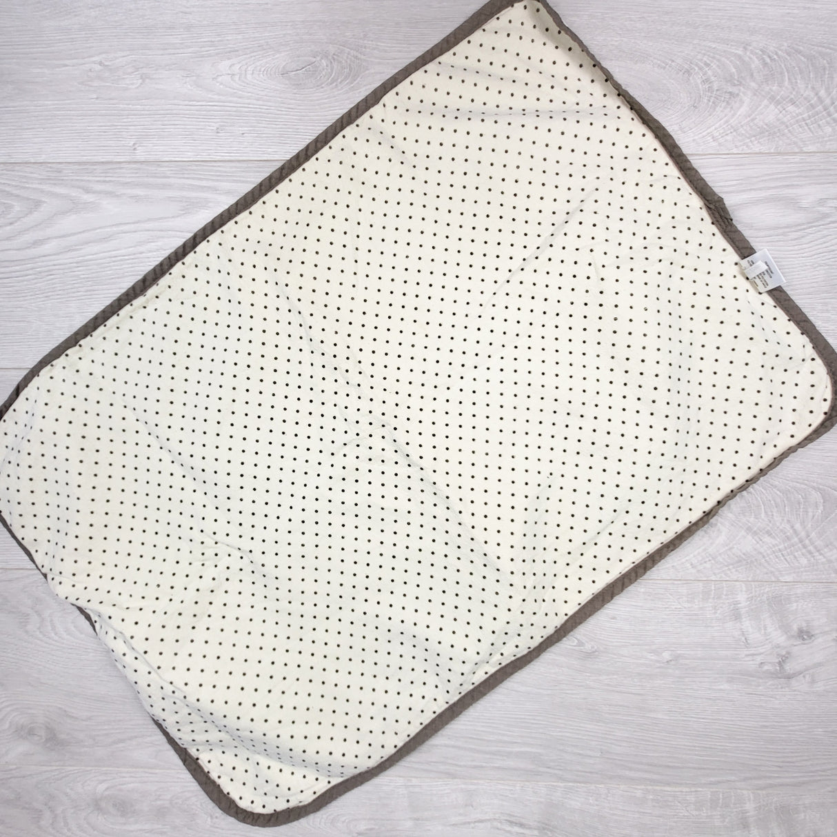Kushies yellow polka dot waterproof change pad