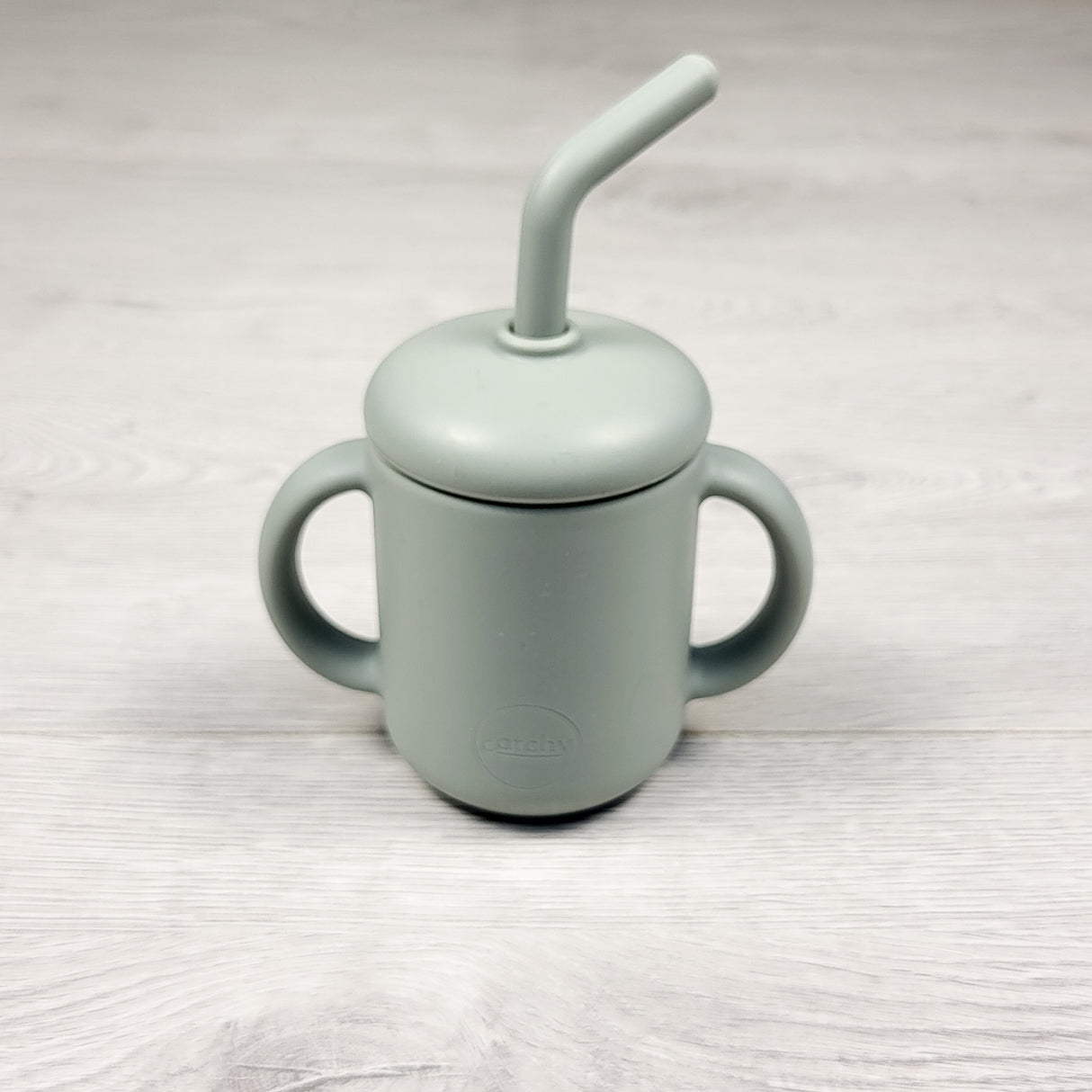 Catchy sage green silicone sippy cup