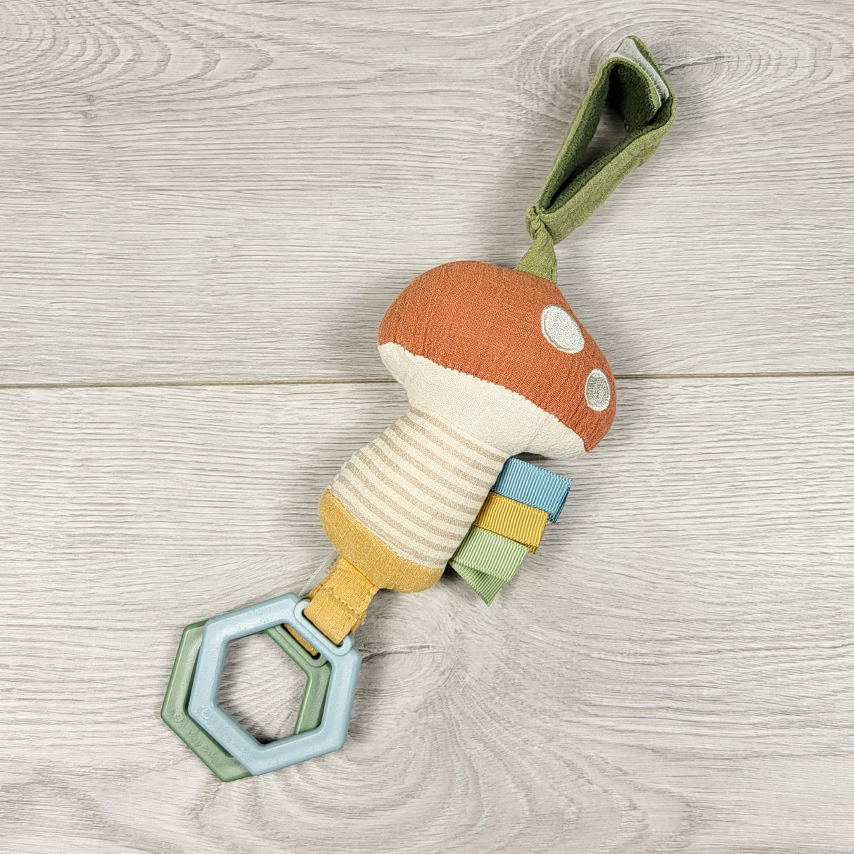 Itzy Ritzy mushroom stroller toy / teether