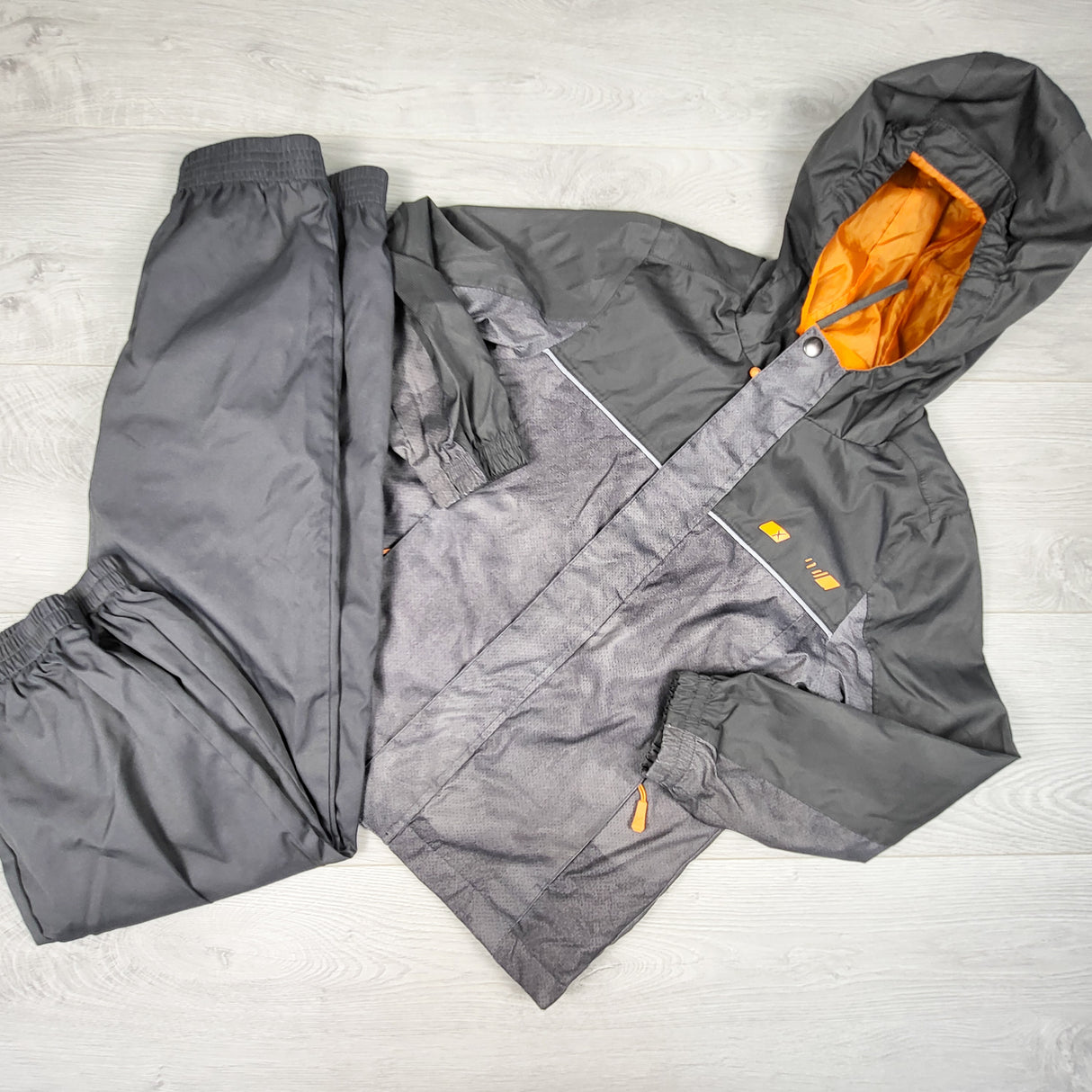 XMTN grey 2pc rain set. Size 6/6X - AS IS