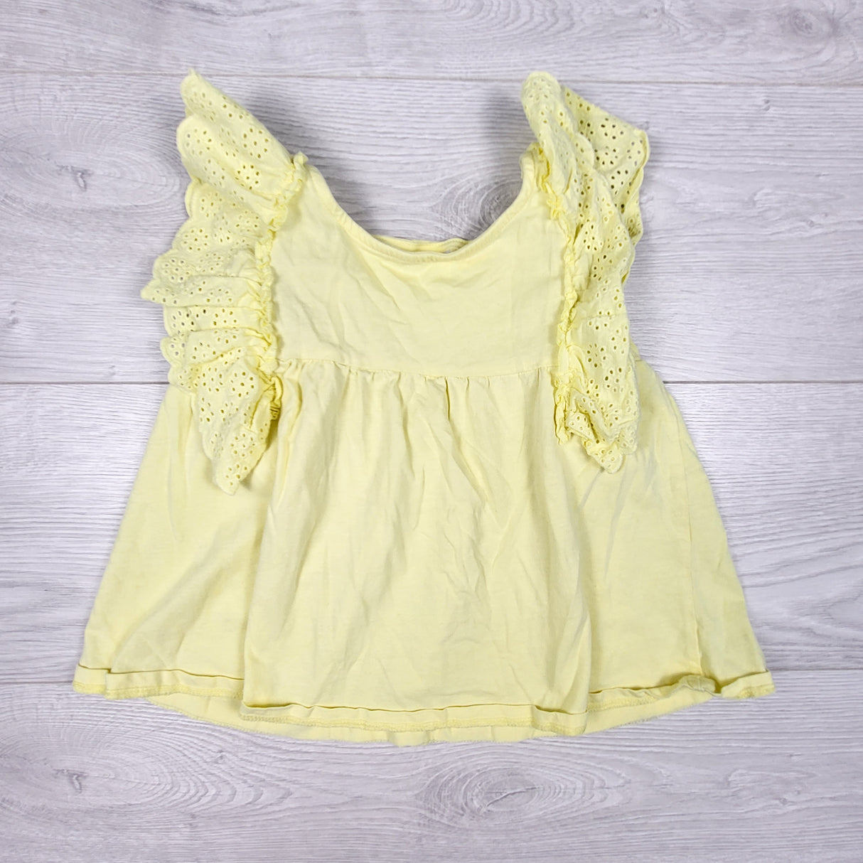 Zara yellow ruffle top with eyelet trim. Size 3/4T