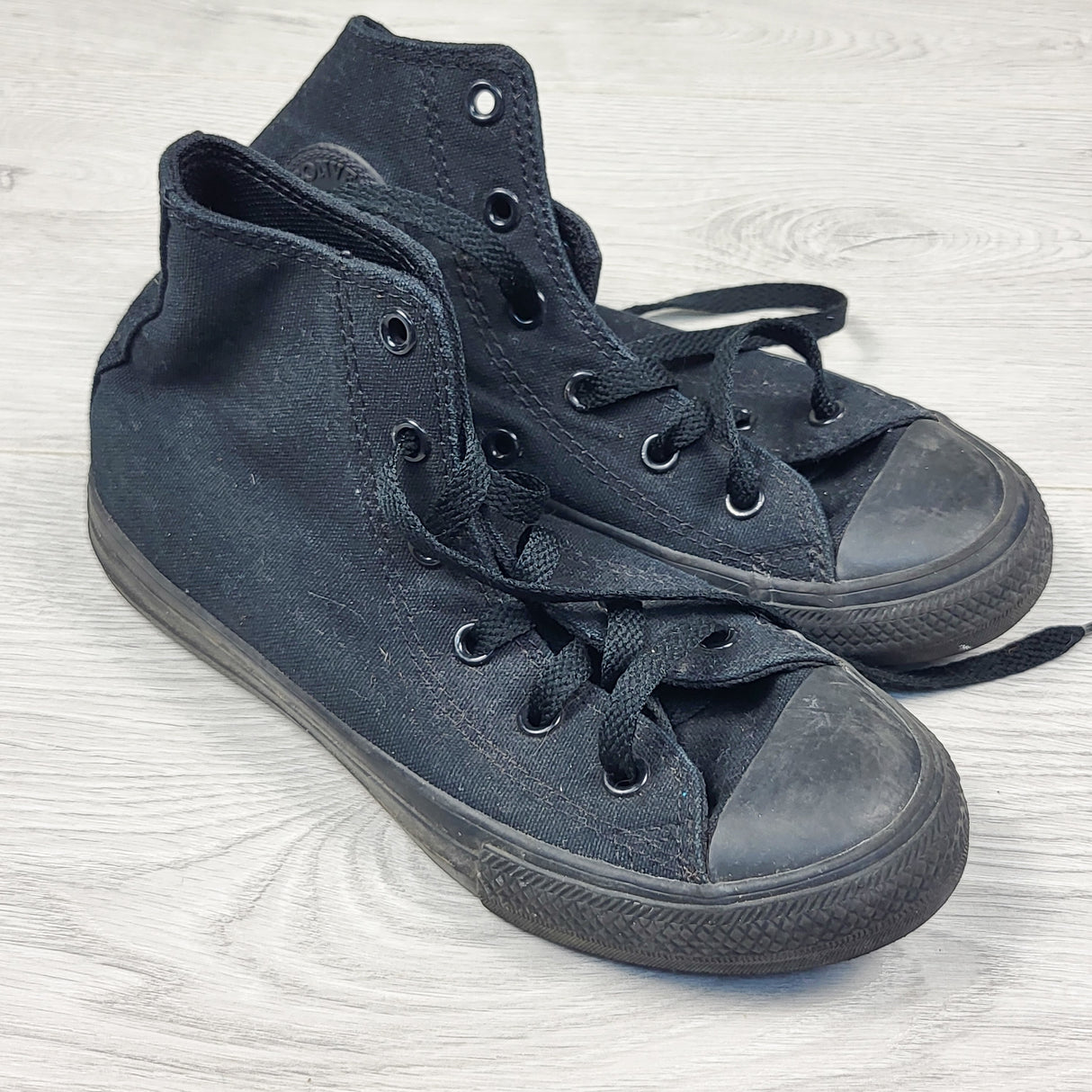 Converse black high top canvas shoes. Youth size 1