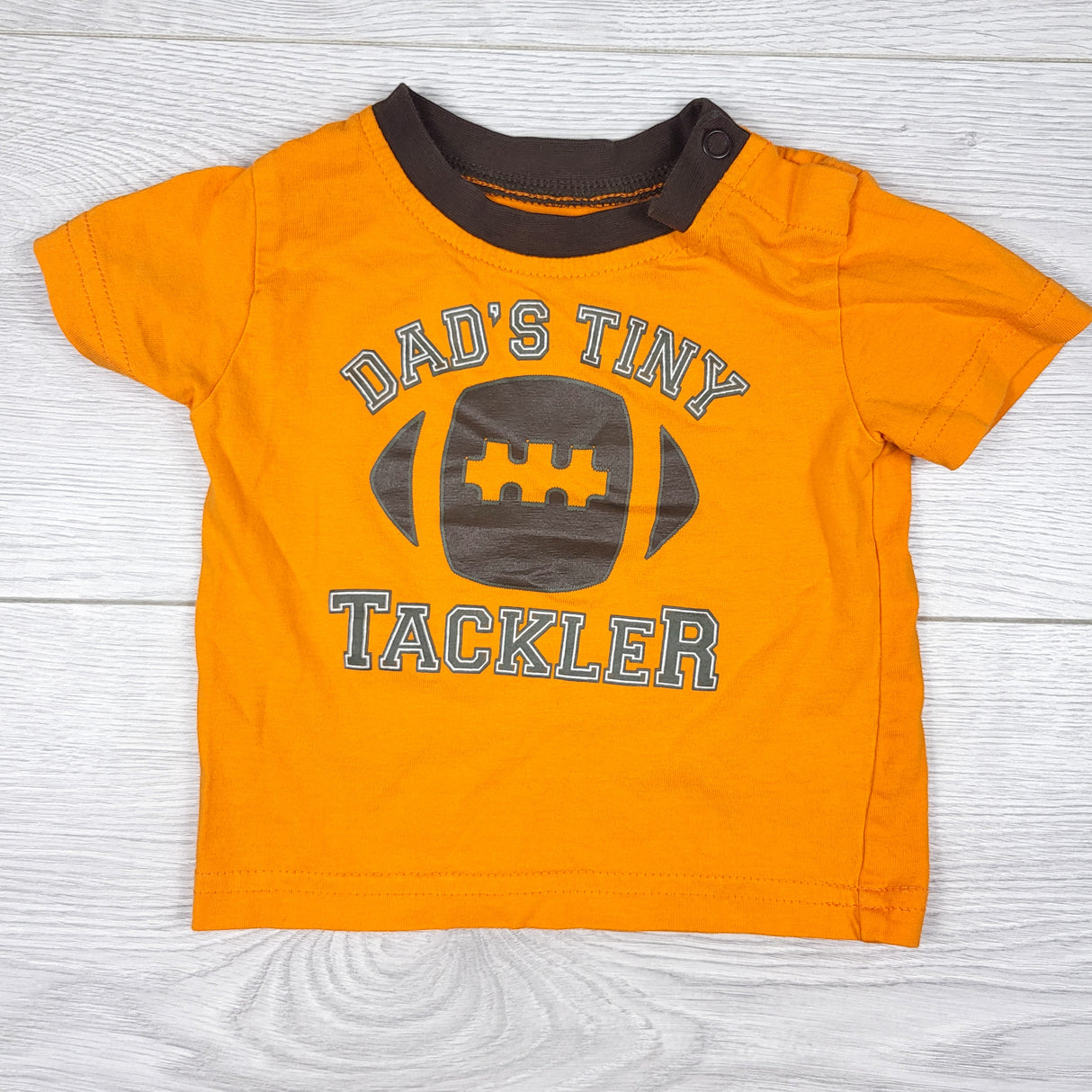 George orange "Daddy's Tiny Tackler" t-shirt. Size 3-6 months