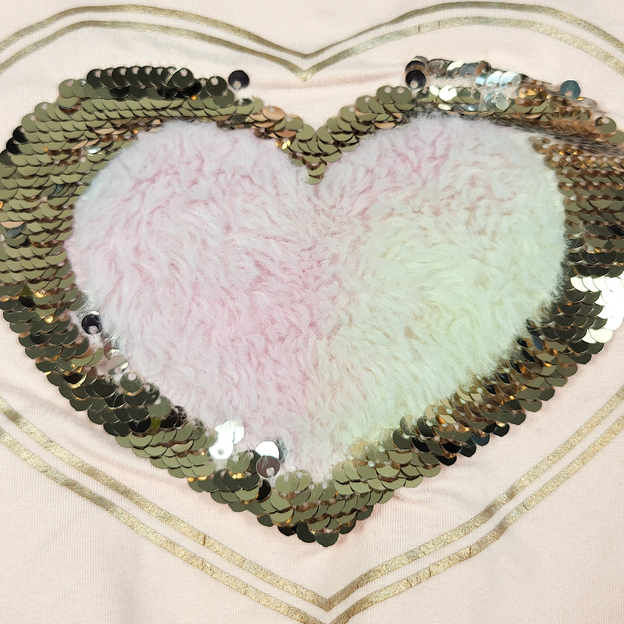 Btween pink top with fuzzy sequin heart. Size 10/12