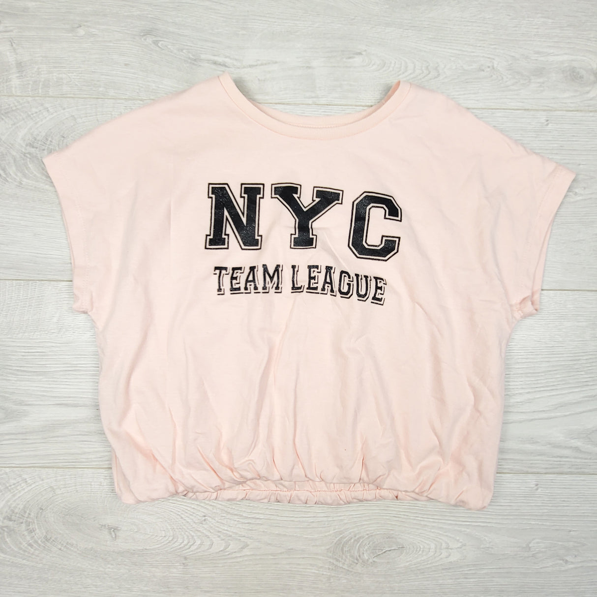 George pink cropped double knit "NYC" t-shirt. Size 14/16