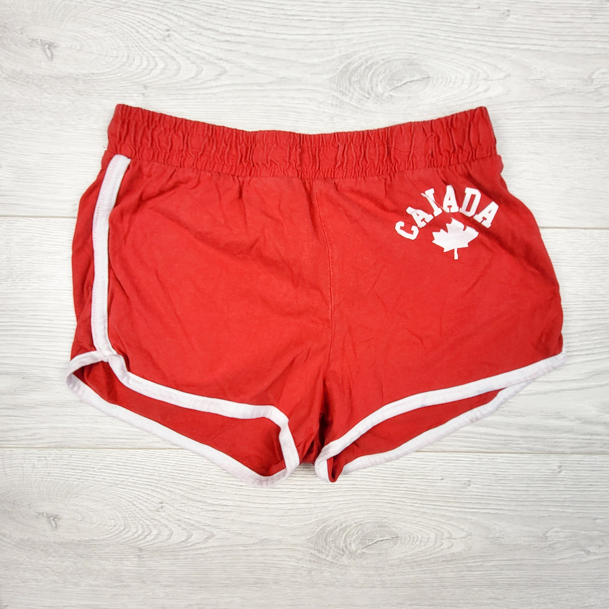 Urban Kids red "Canada" shorts. Size 10/12